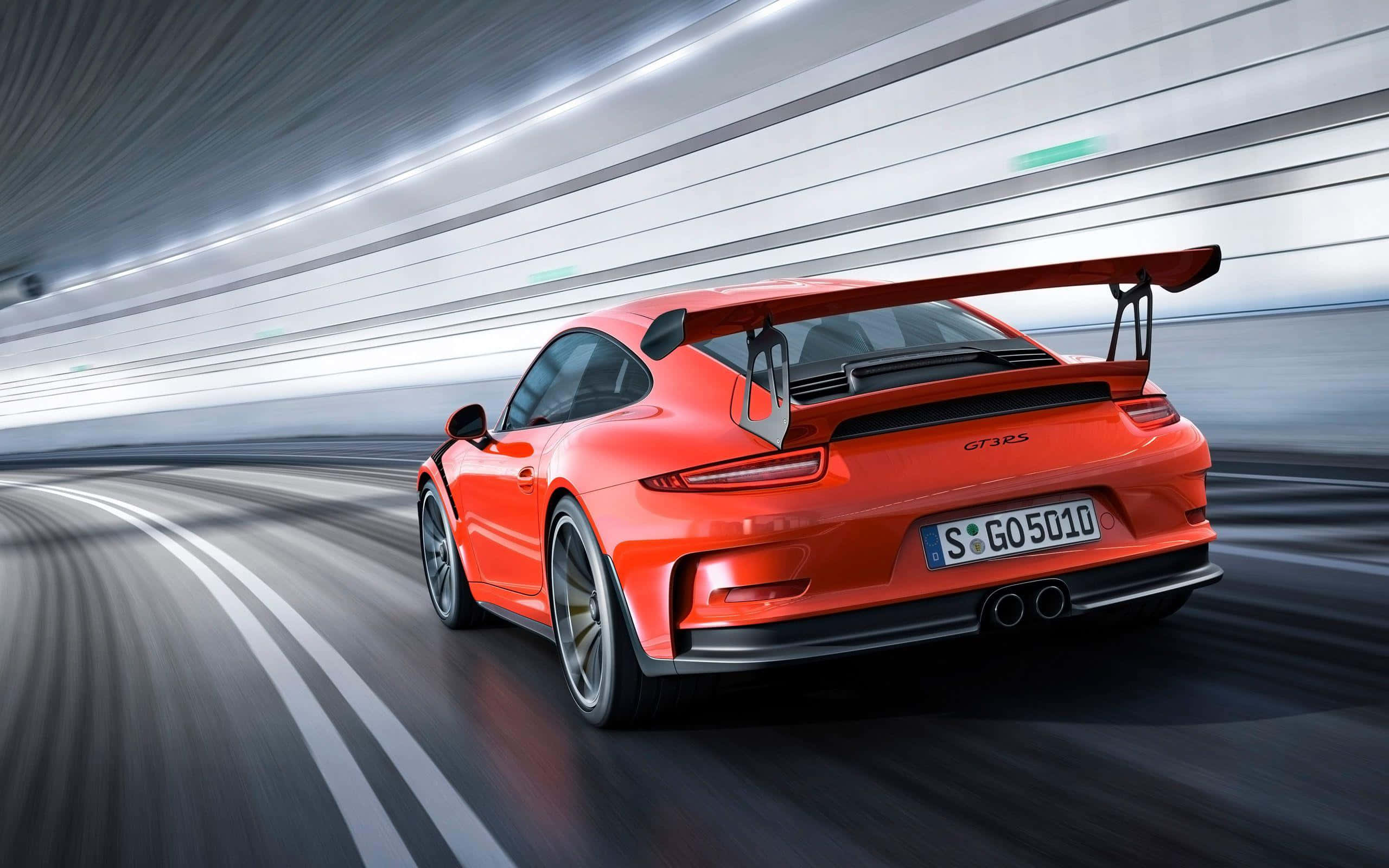 Porsche 911 GT3 RS, vibrant orange, sleek tunnel, 2K Desktop Wallpaper