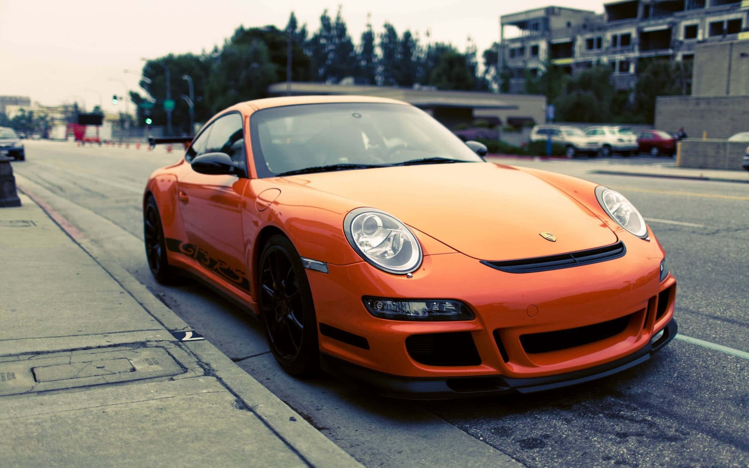 Porsche 911 GT3 RS, orange, urban setting, 2K Desktop Wallpaper