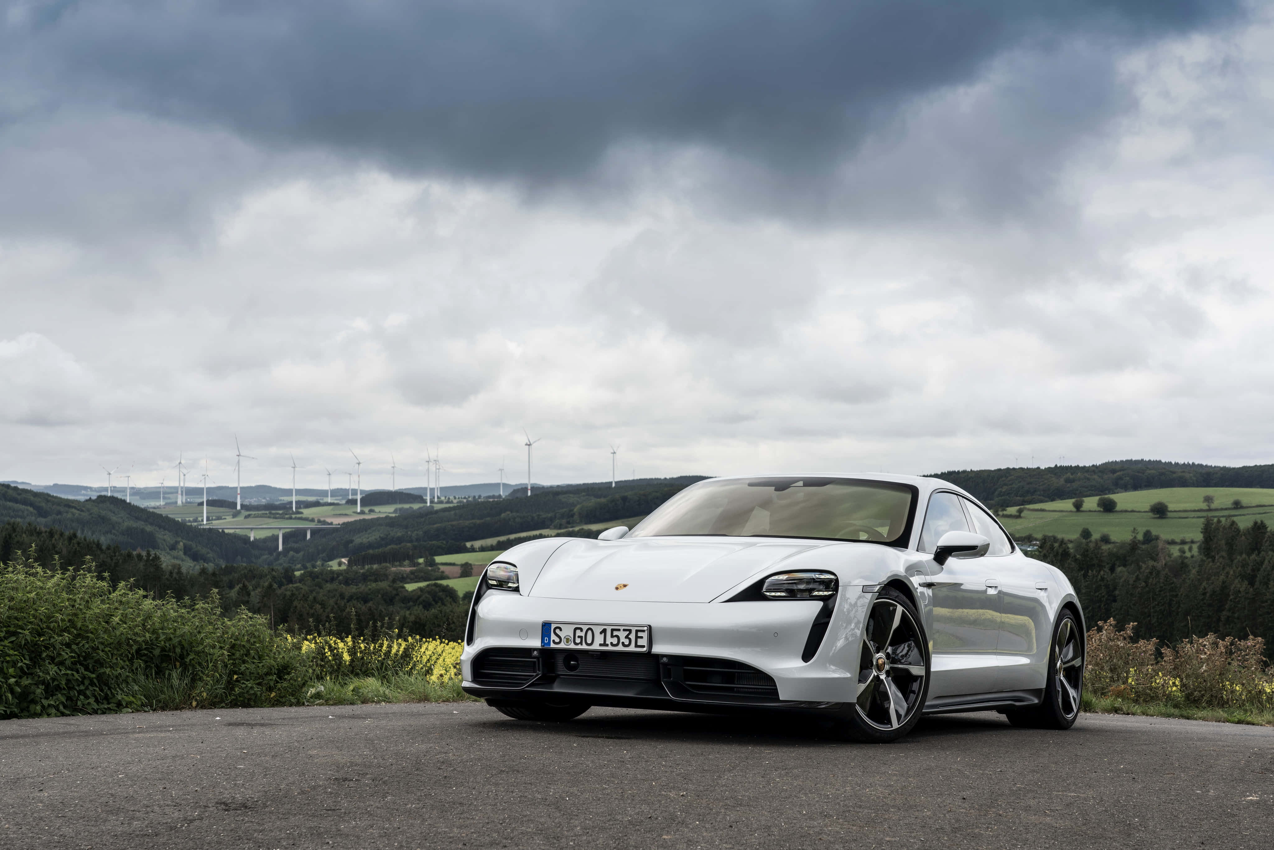 Porsche Taycan, white, rolling green hills, 4K Desktop Wallpaper