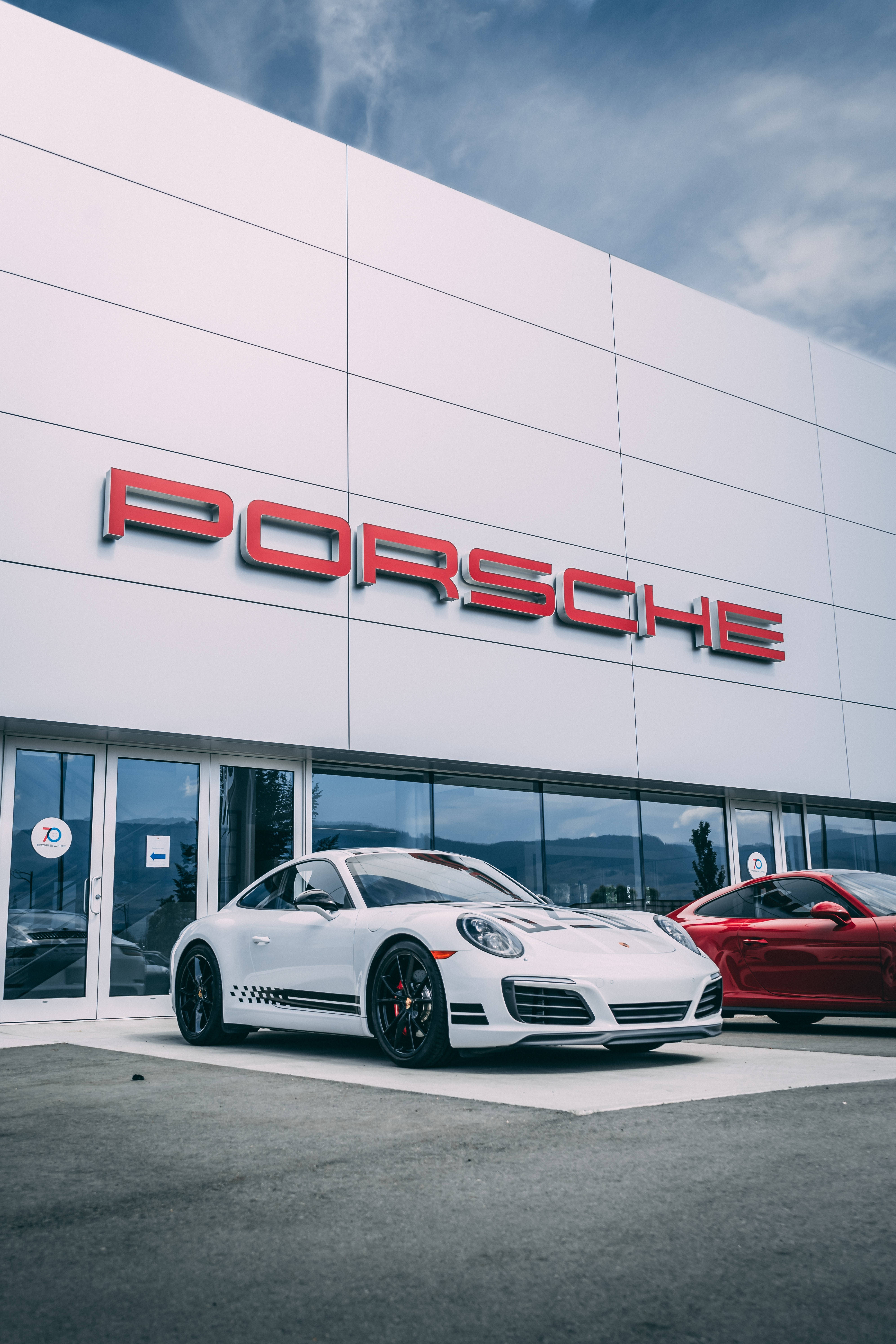 Porsche 911, white, modern dealership, 5K Phone Wallpaper