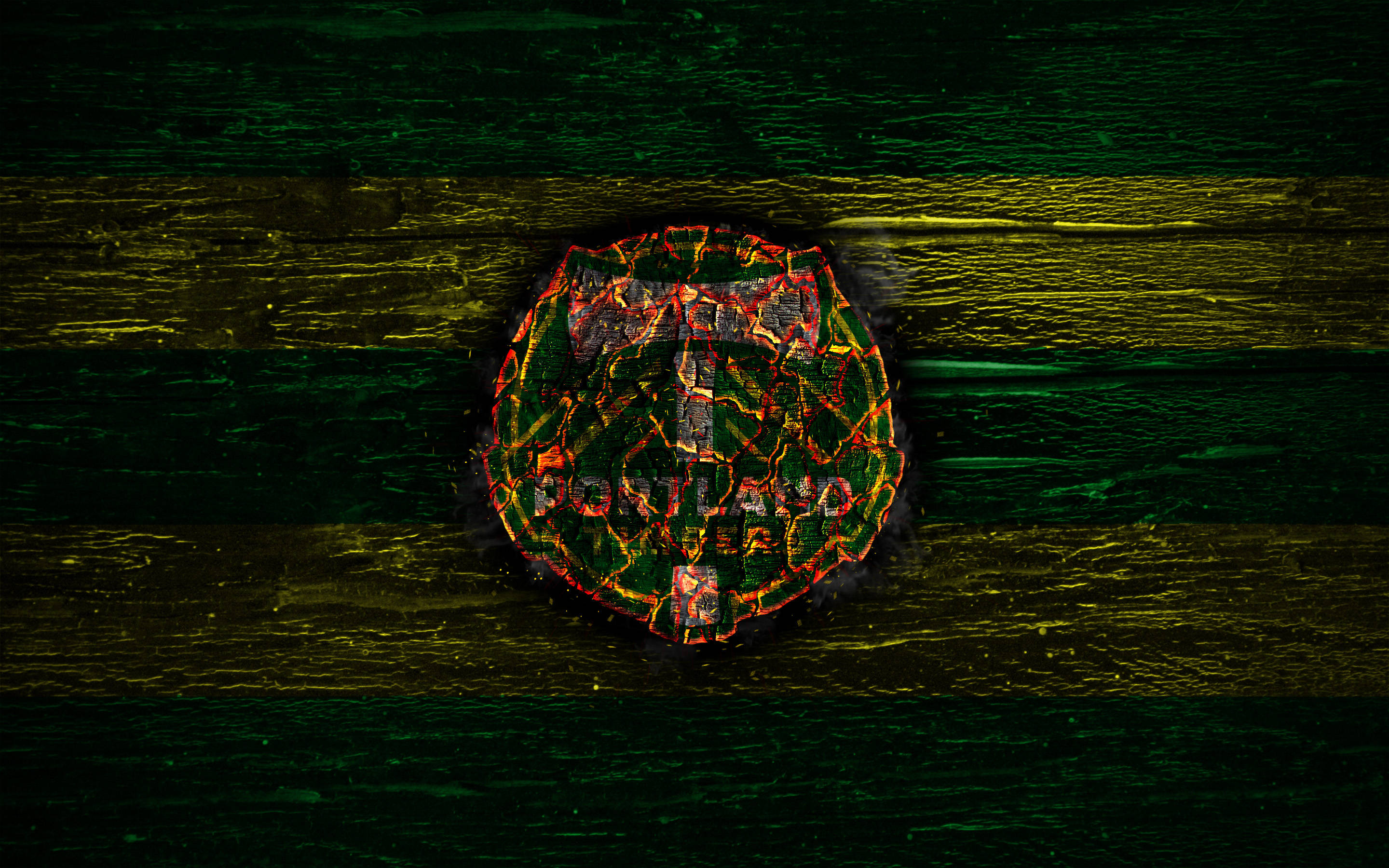 Portland Timbers, glowing circular emblem, fiery orange and red cracks, 2K Desktop Wallpaper