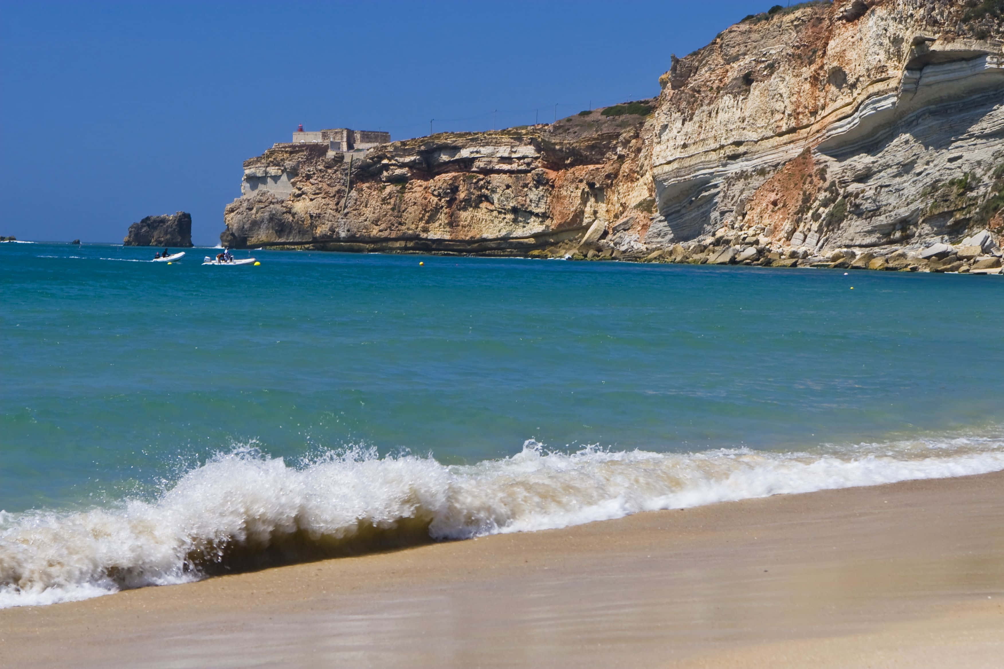 Portuguese Beach, turquoise waves, golden sand, 2K Desktop Wallpaper
