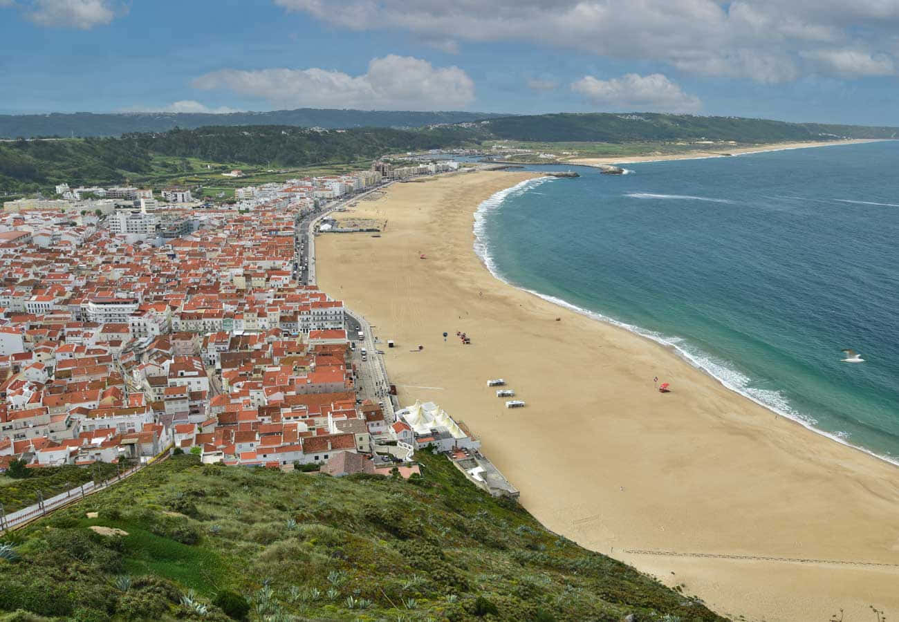 Portuguese Beach, red-roofed buildings, golden beach, HD Desktop Wallpaper