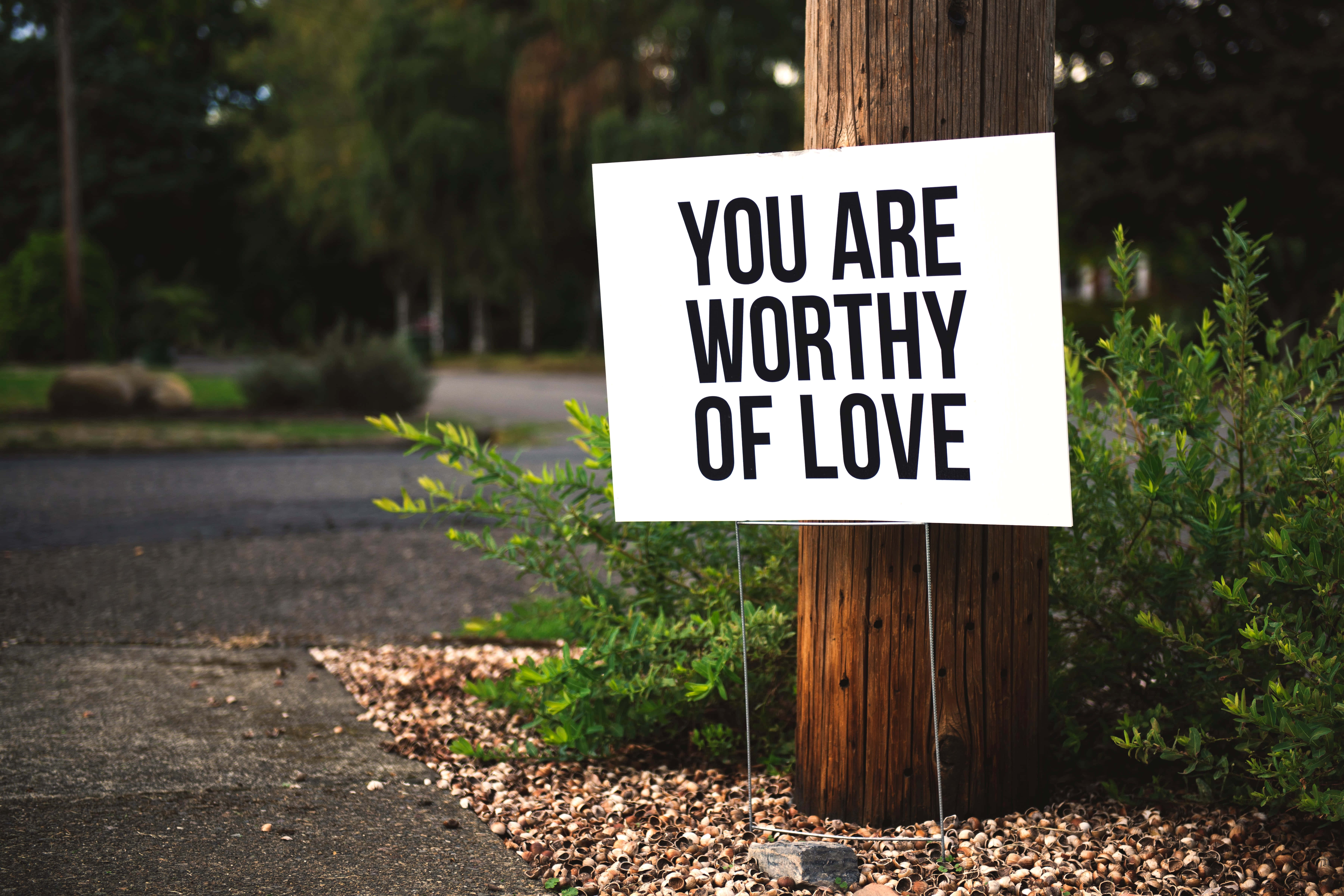 YOU ARE WORTHY OF LOVE, white sign, wooden post, 5K Desktop Wallpaper