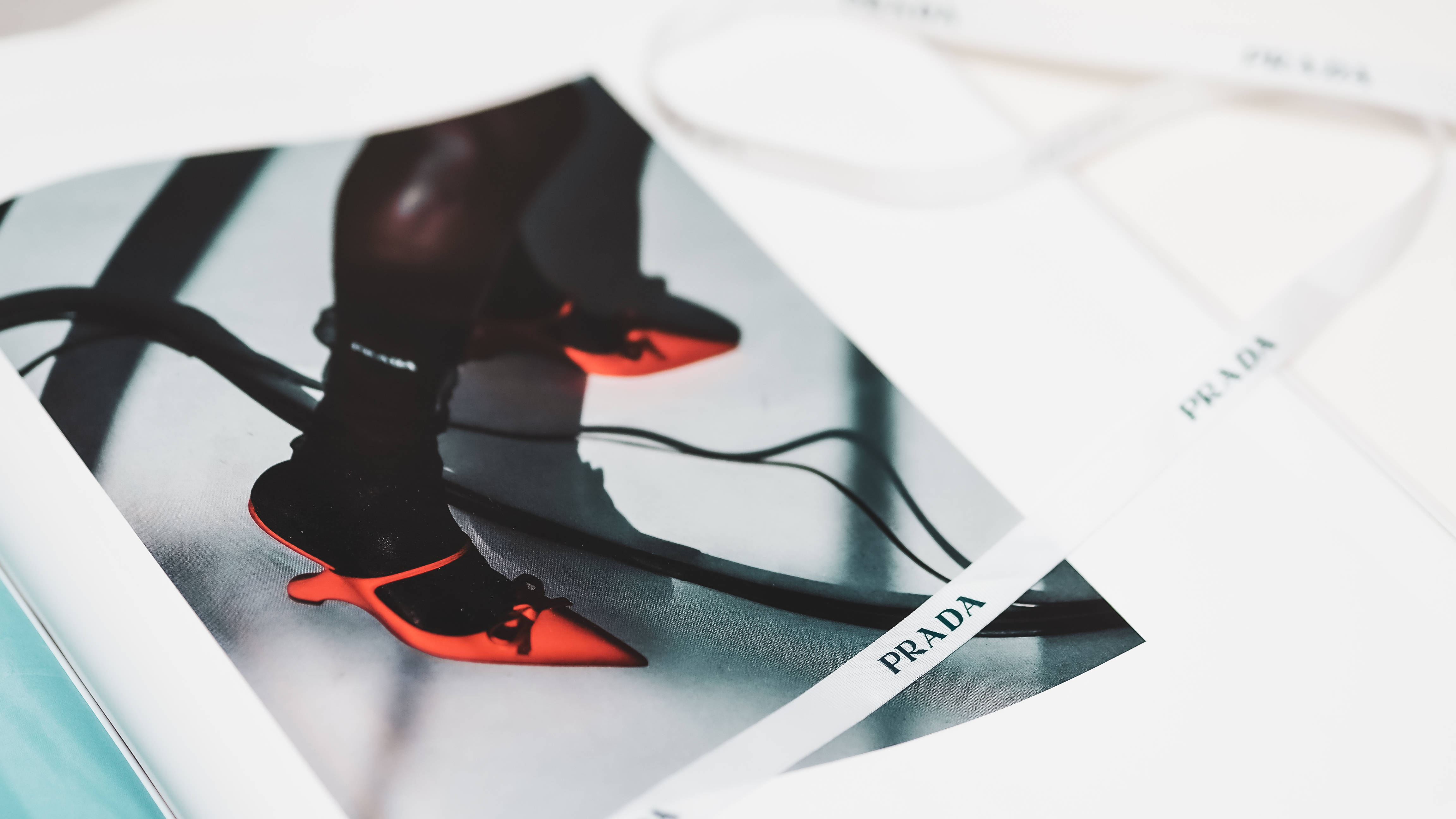 Prada, white ribbon, glossy magazine page, 4K Desktop Wallpaper