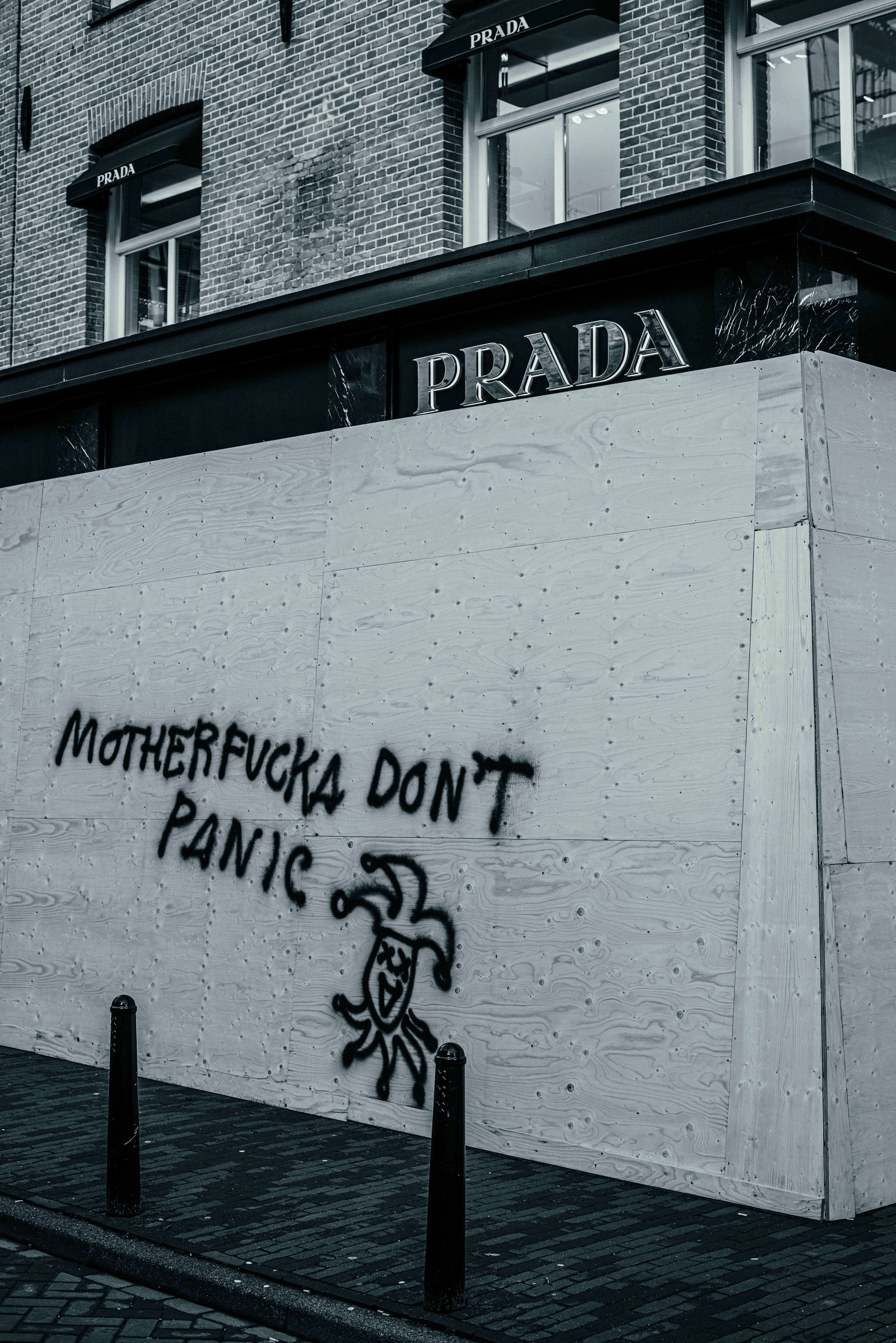 Prada, black and white urban scene, plywood wall, 5K Phone Wallpaper