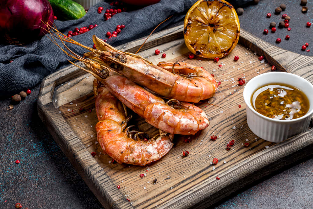 grilled prawns, rustic wooden board, charred lemon half, SD Desktop Wallpaper