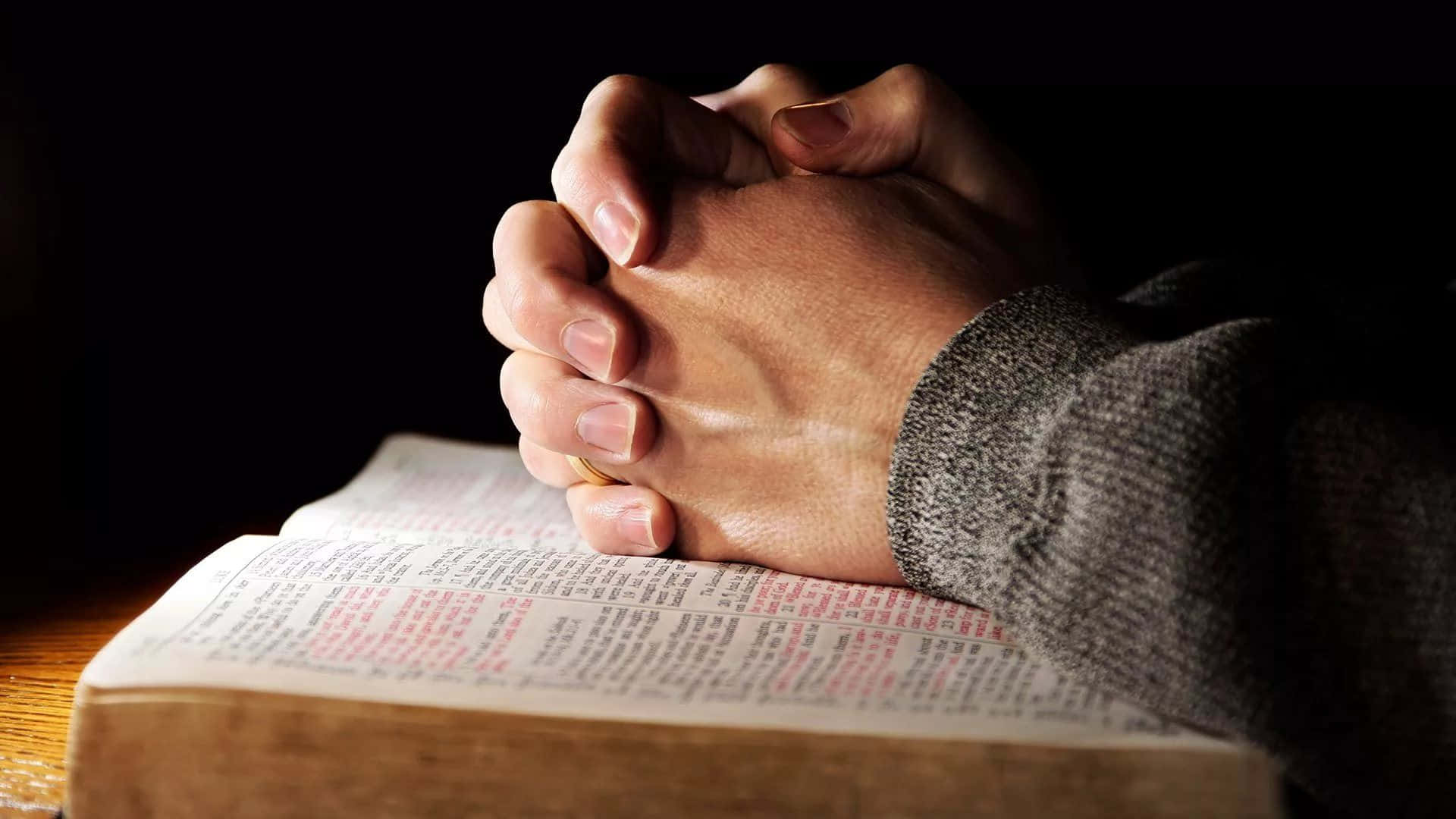 praying hands, open holy book, warm focused light, Full HD Desktop Wallpaper