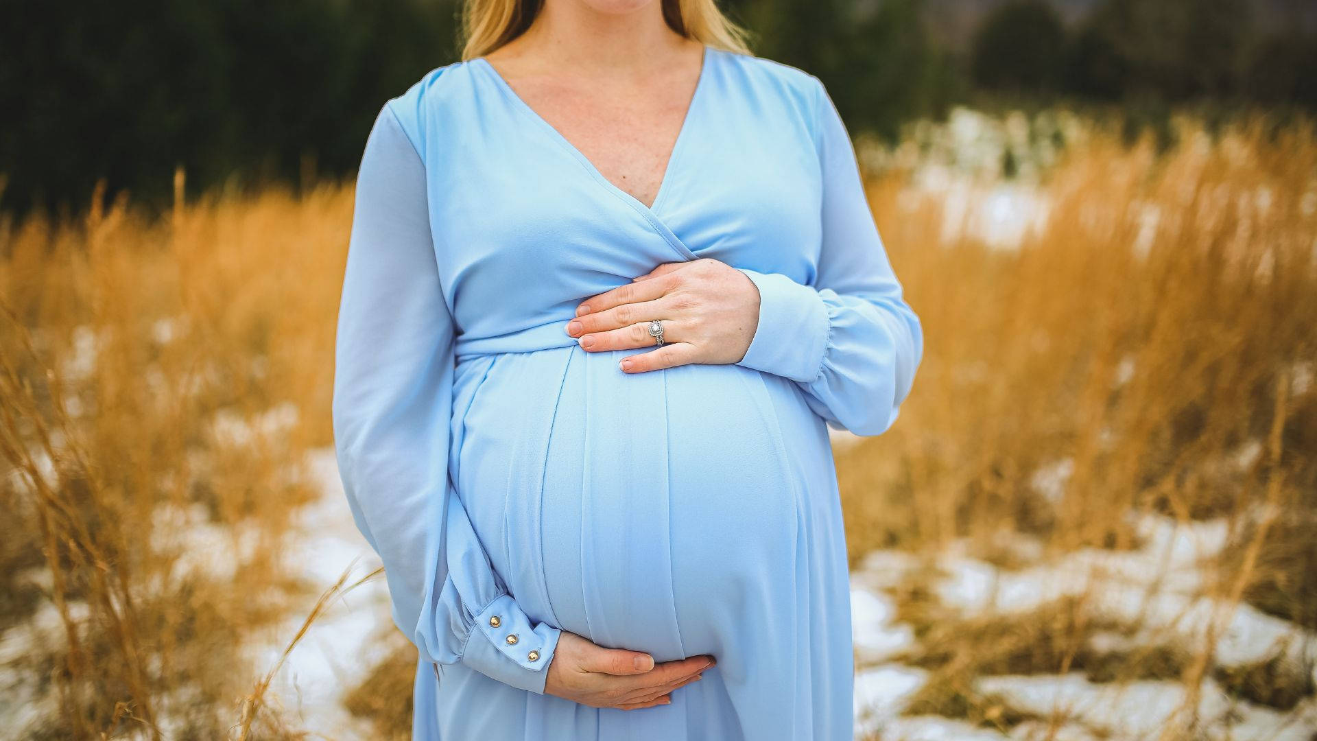 light blue dress, pregnant woman, snowy golden grass, Full HD Desktop Wallpaper