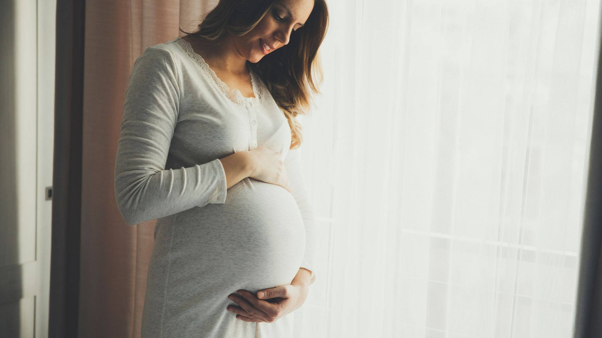 pregnant woman, soft gray dress, bright window, Full HD Desktop Wallpaper