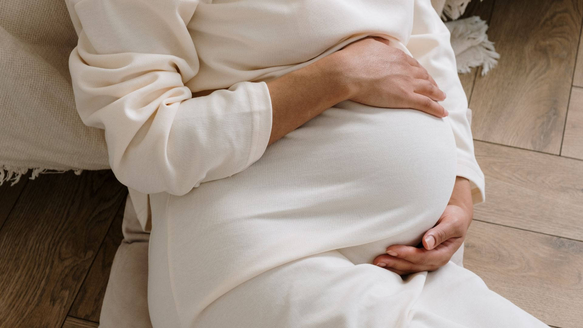white dress, pregnant woman, textured couch, Full HD Desktop Wallpaper