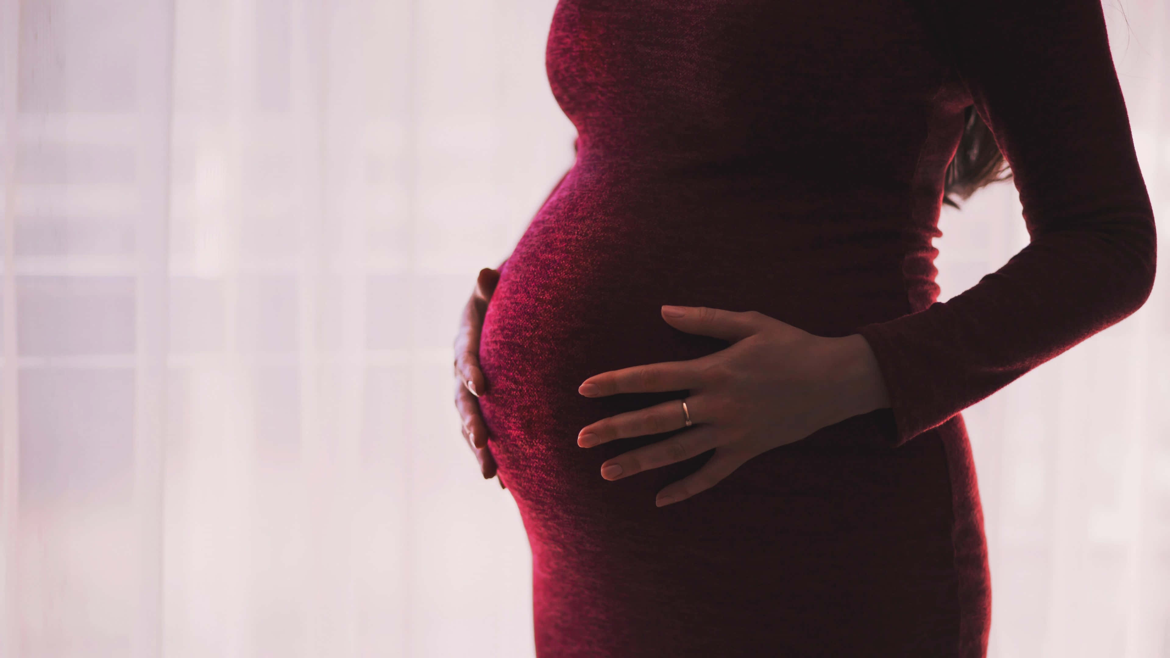pregnant woman, deep red dress, belly, 4K Desktop Wallpaper