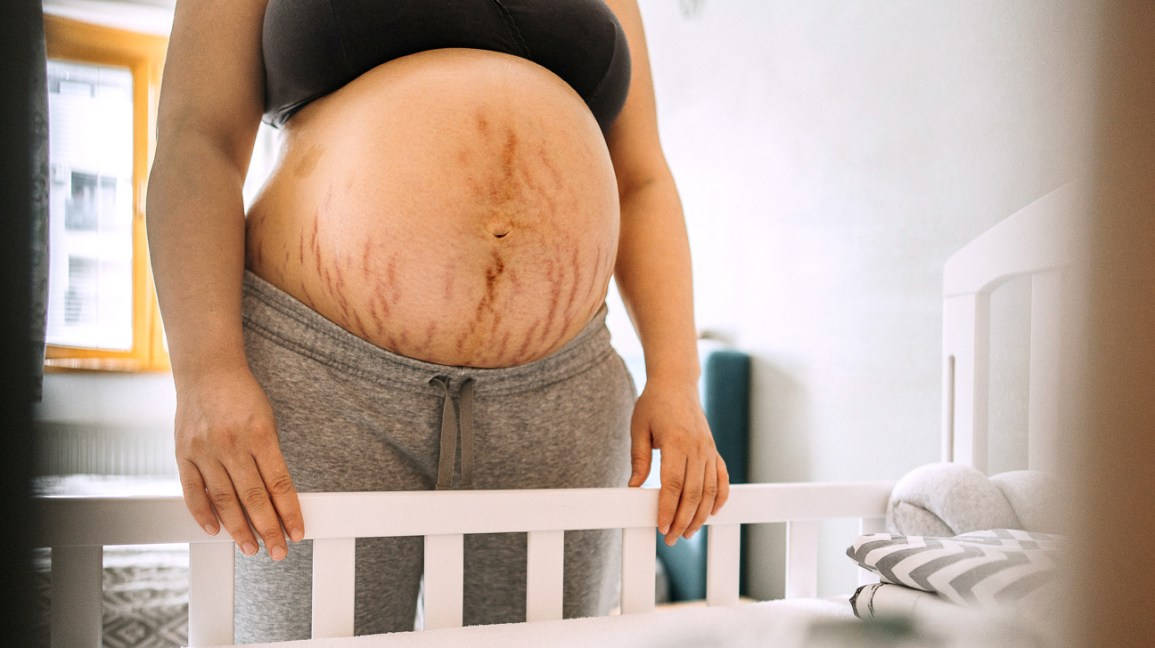 pregnant belly, stretch marks, white crib, SD Desktop Wallpaper