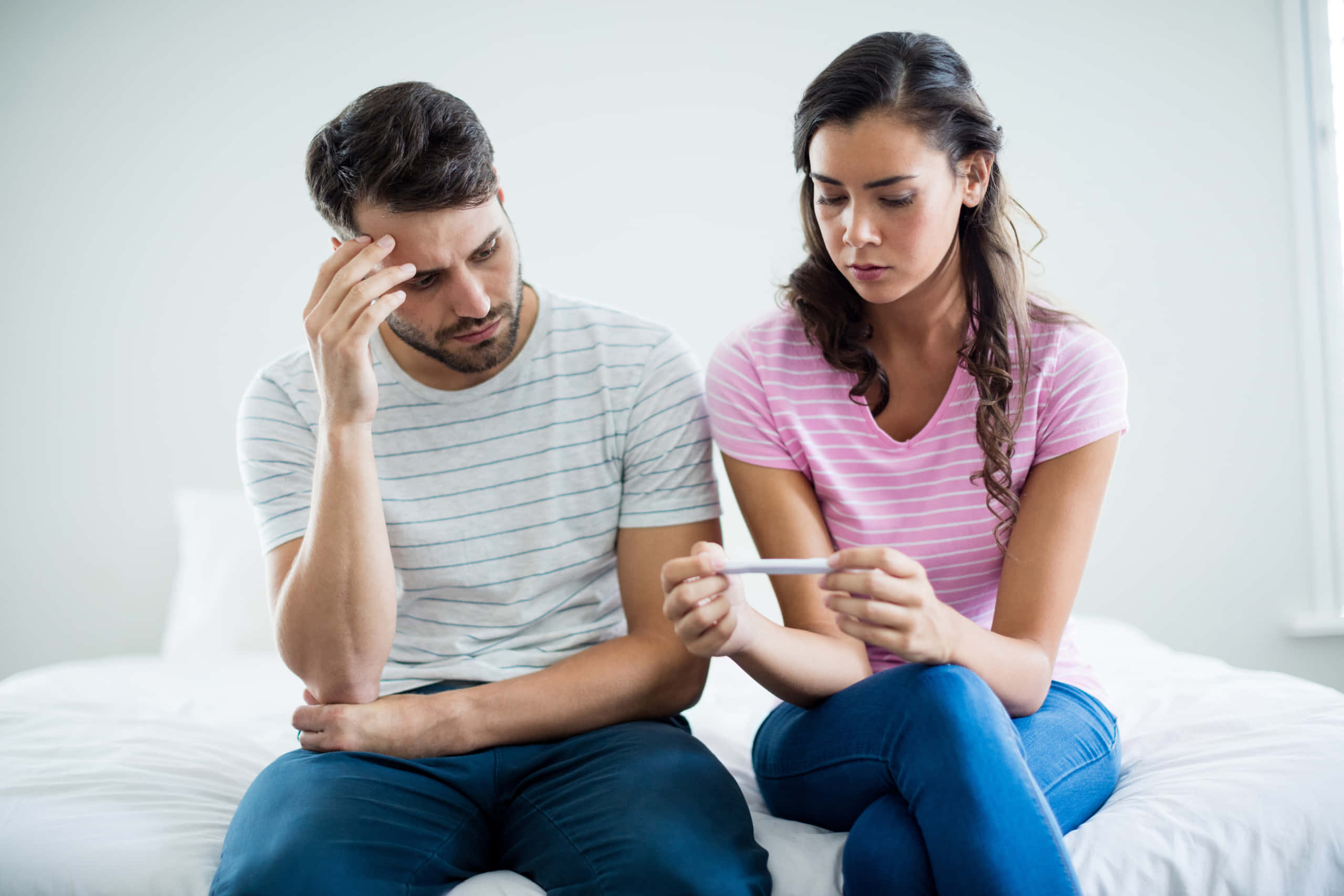 couple, bed, pregnancy test, 2K Desktop Wallpaper