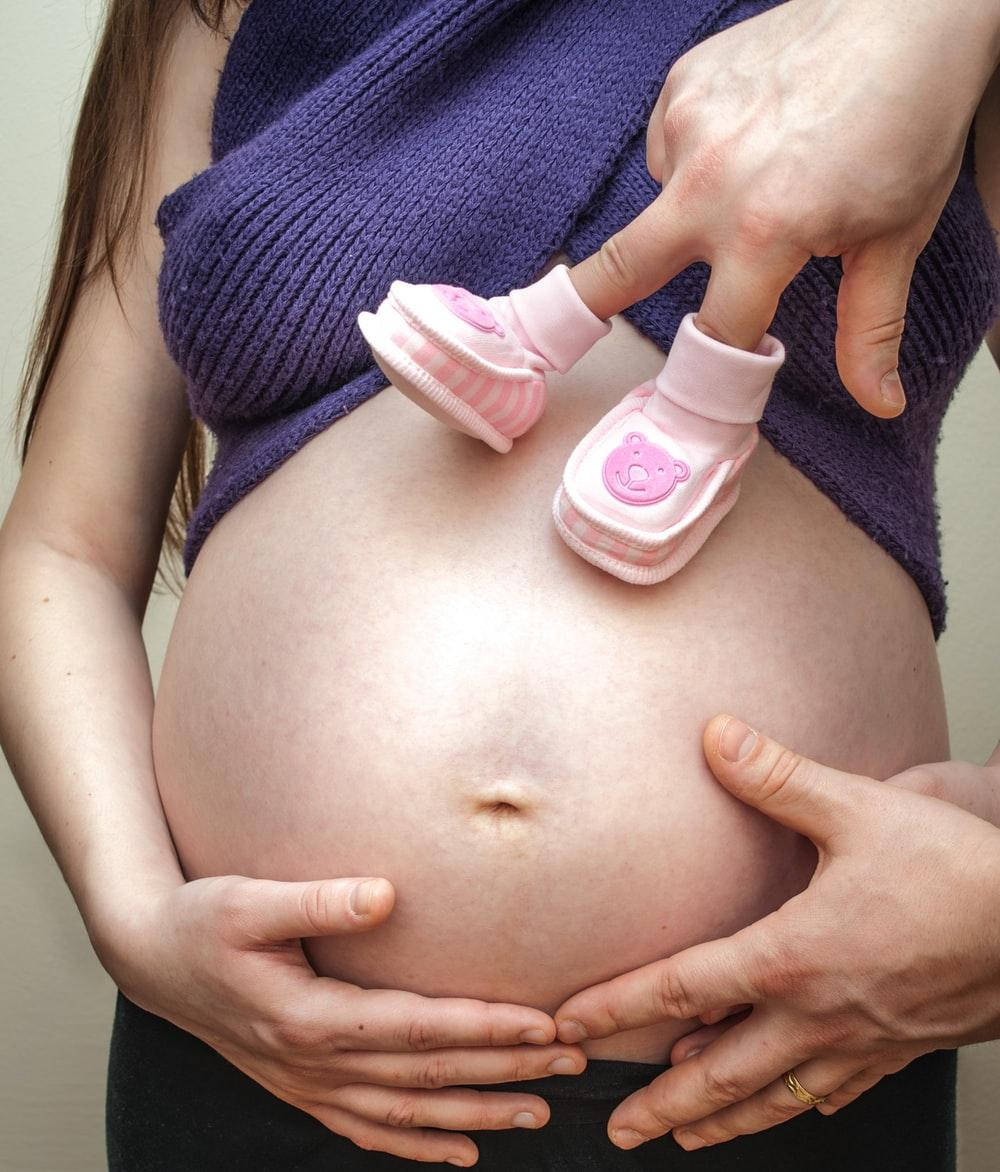 pregnant belly, baby shoes, pink booties, SD Phone Wallpaper