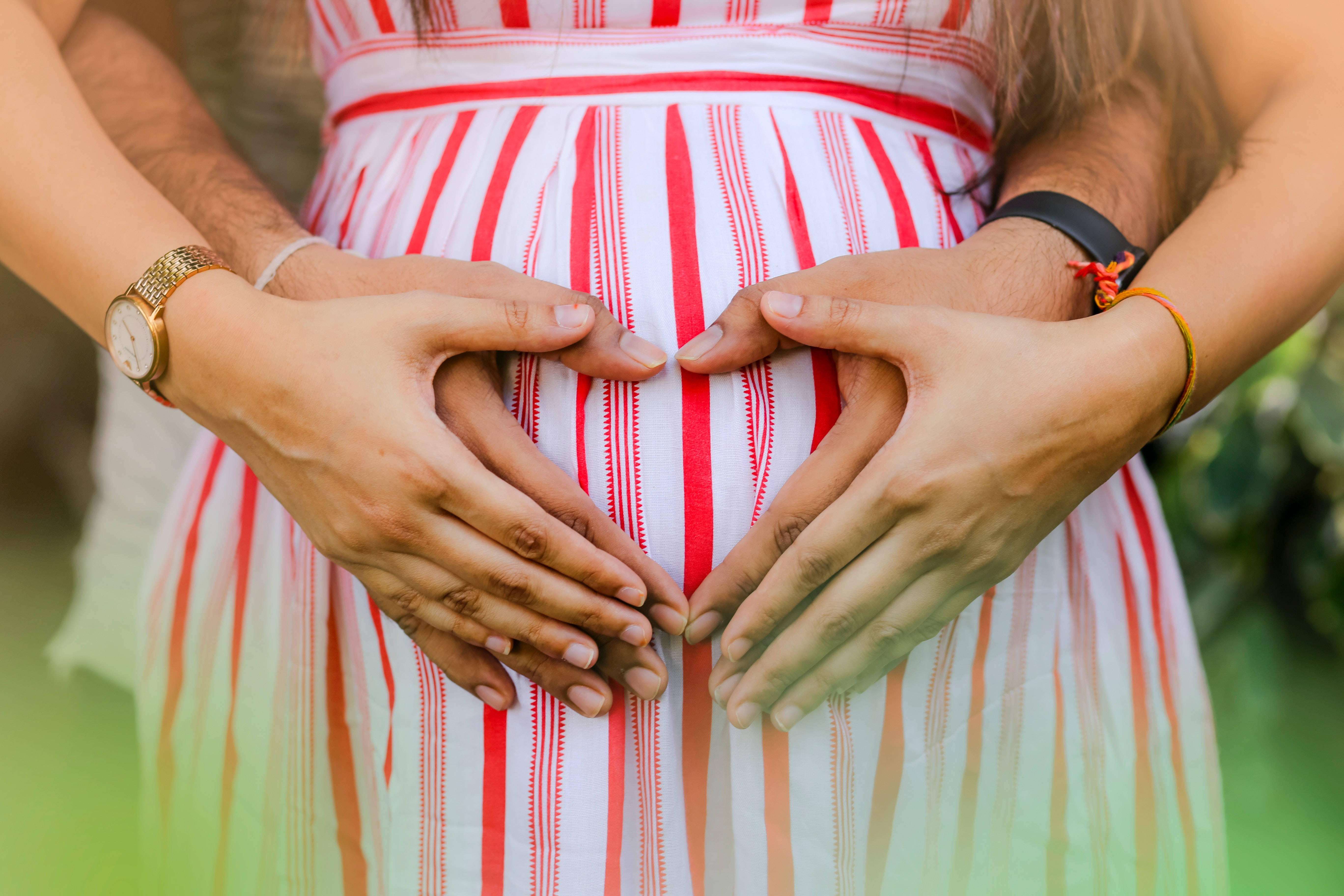 couple hands pregnant belly, red and white striped dress, heart shape, 5K Desktop Wallpaper