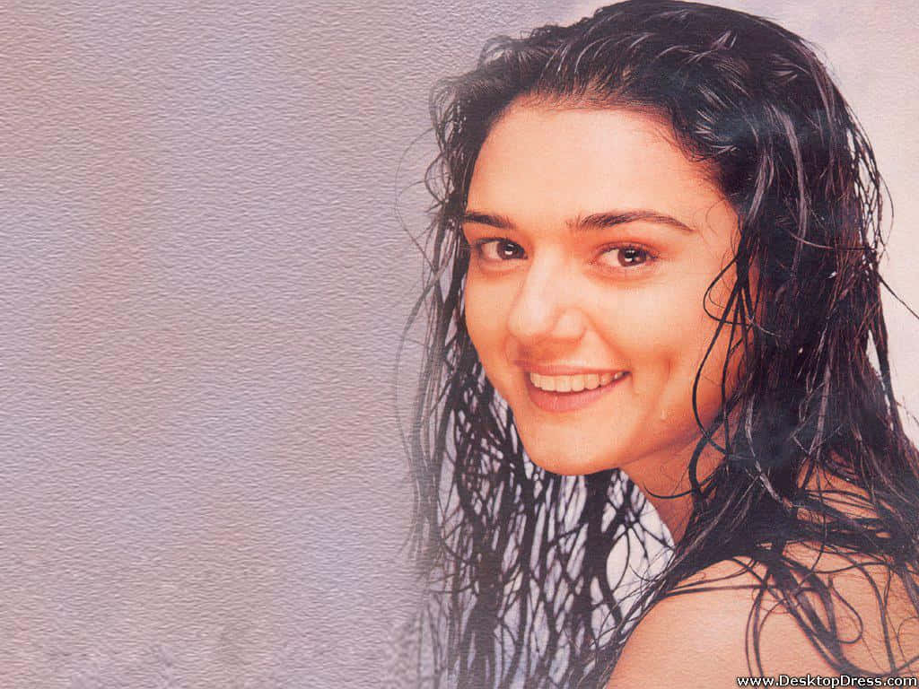 Preity Zinta, wet dark hair, soft textured gray background, SD Desktop Wallpaper