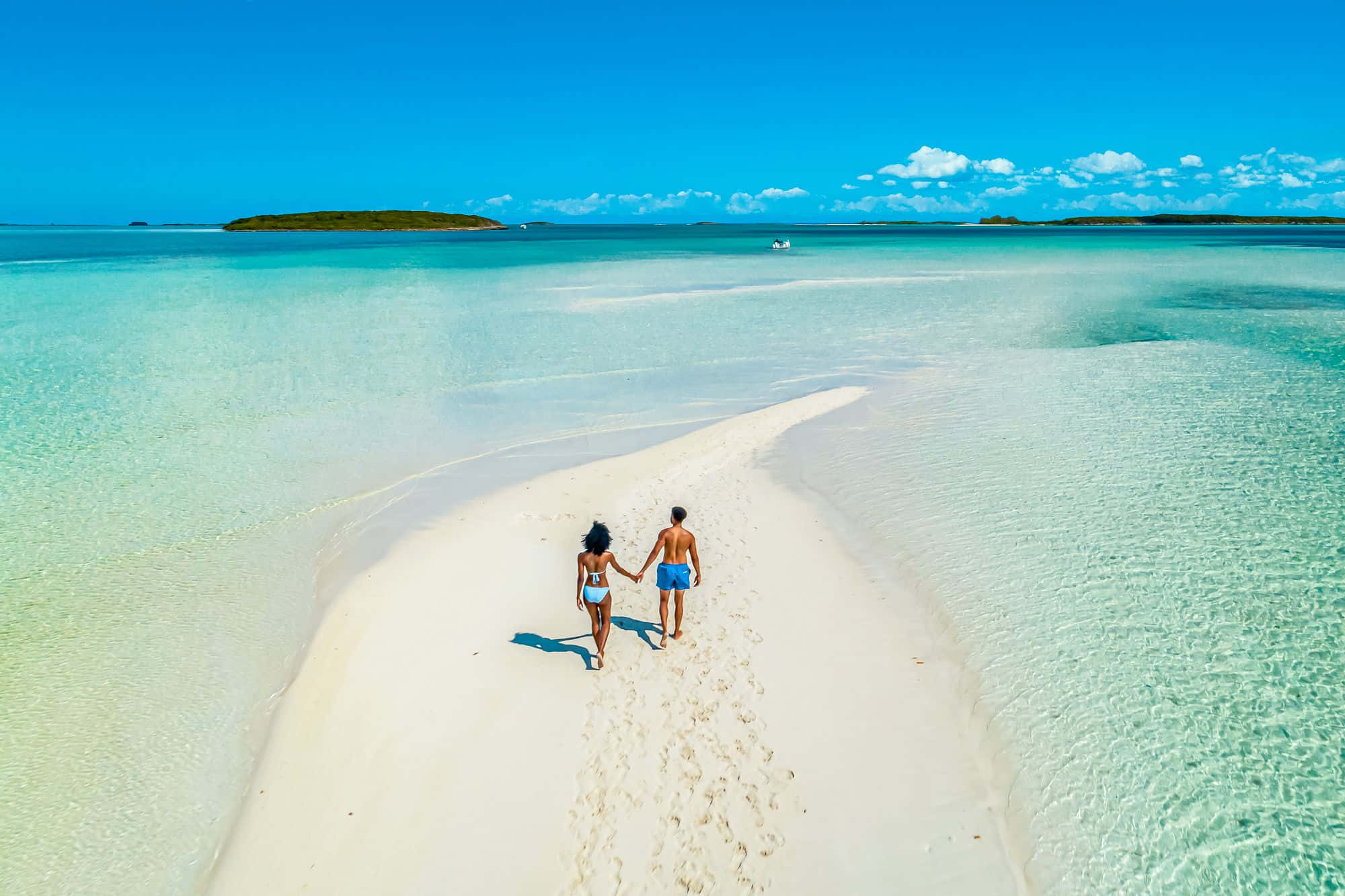 serene beach walk couple, white sandbar, crystal clear turquoise waters, Full HD Desktop Wallpaper