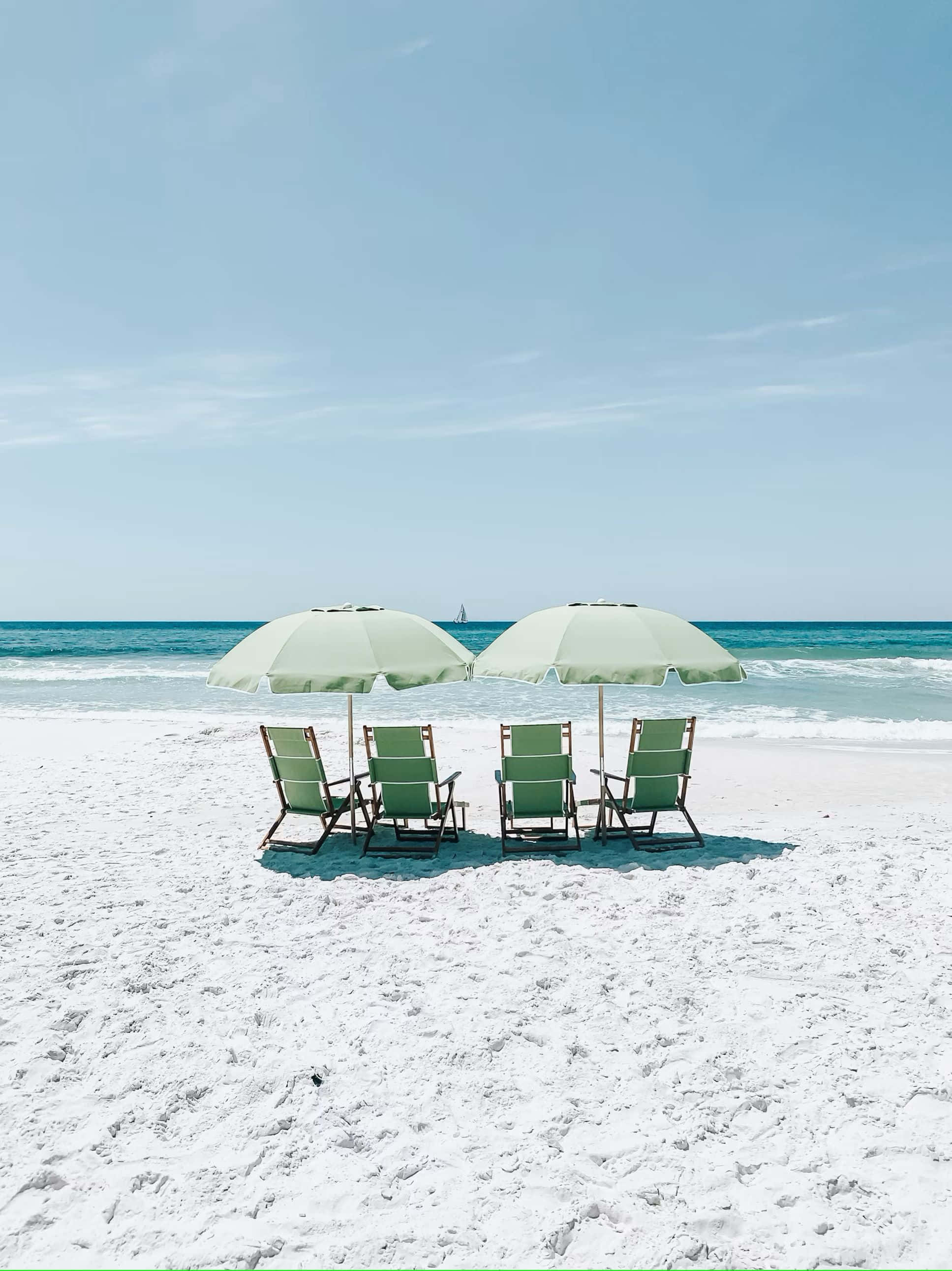 green beach chairs, matching umbrellas, pristine white sand, 2K Phone Wallpaper