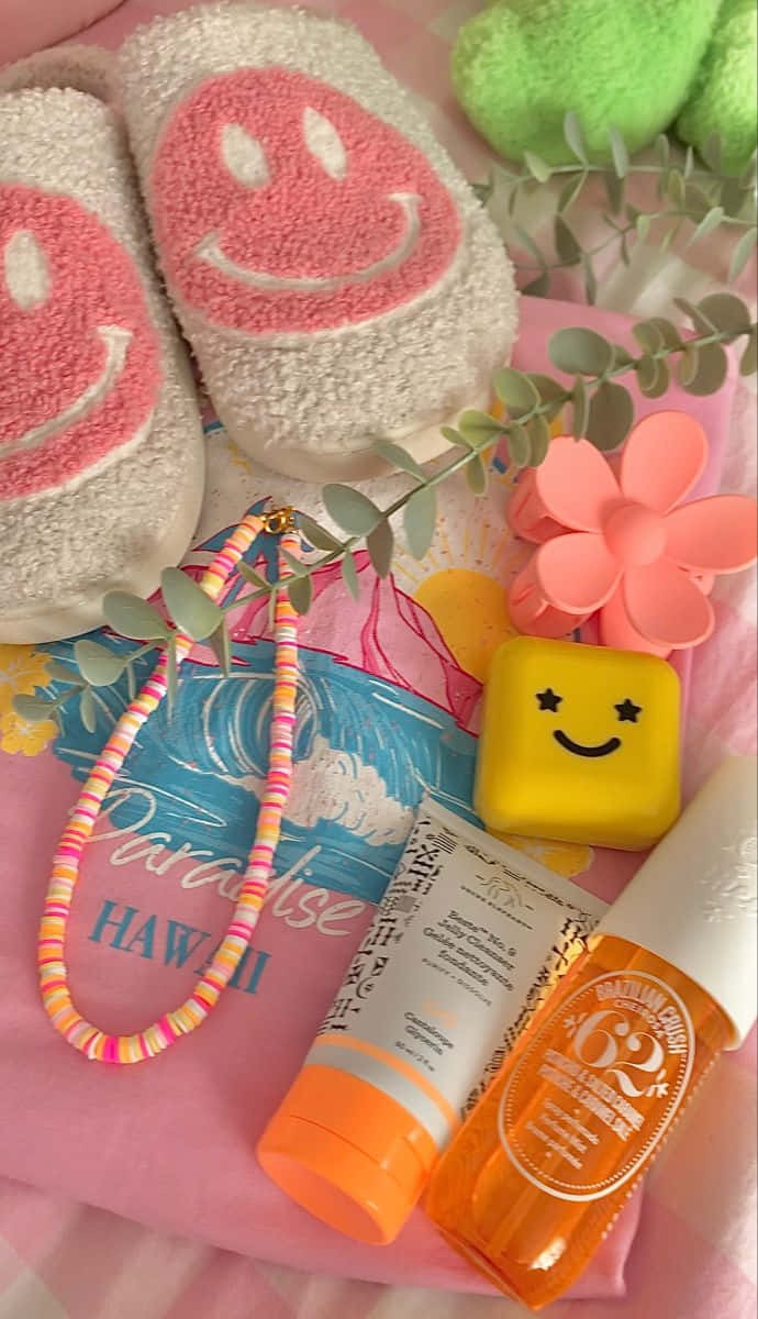pink smiley face slippers, tropical beach gear, sunscreen, SD Phone Wallpaper
