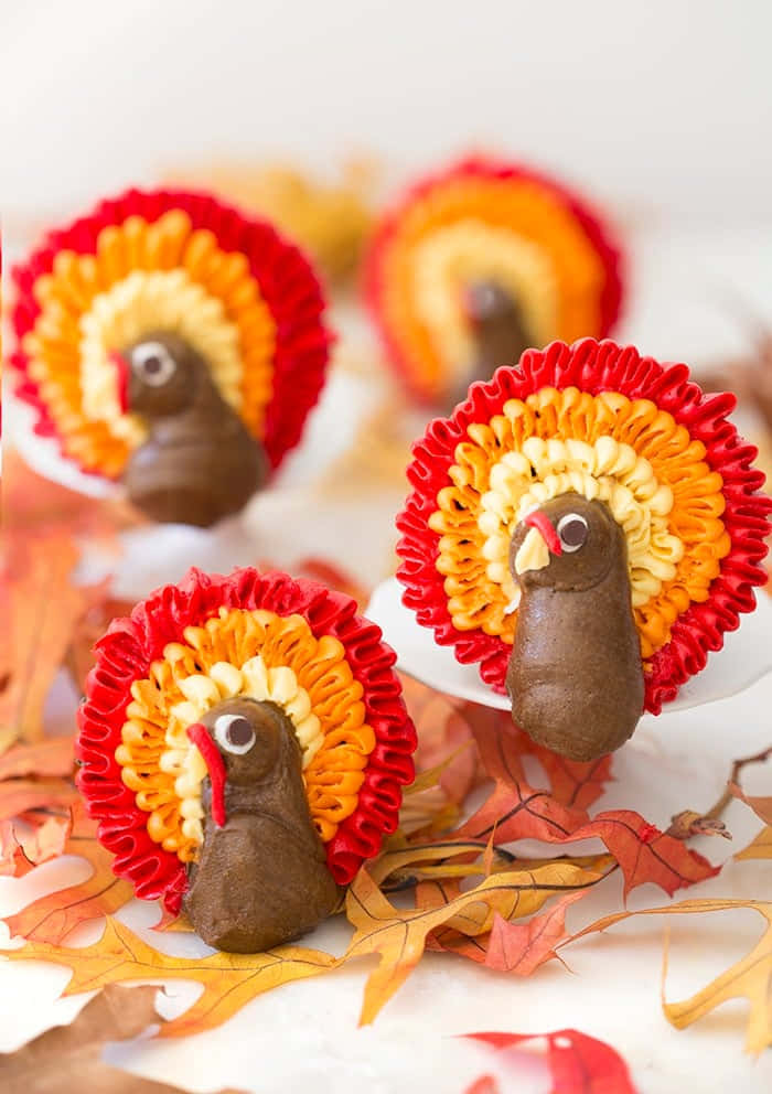 Preppy Thanksgiving, turkey cupcakes, red orange and yellow feather patterns, SD Phone Wallpaper