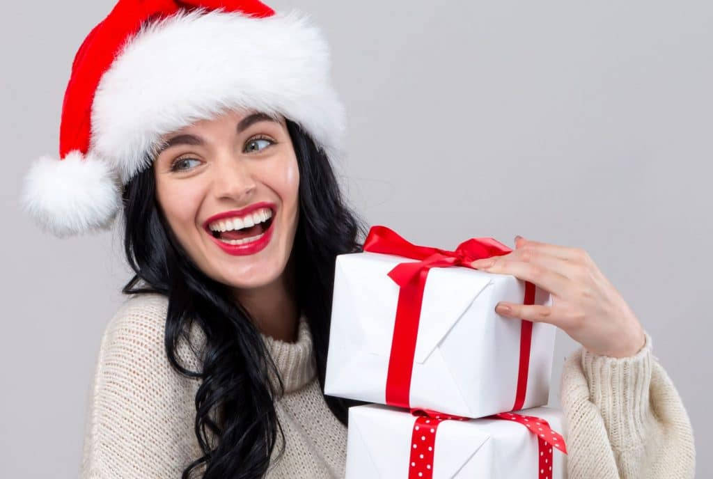 Santa hat, white gift boxes, red ribbons, SD Desktop Wallpaper