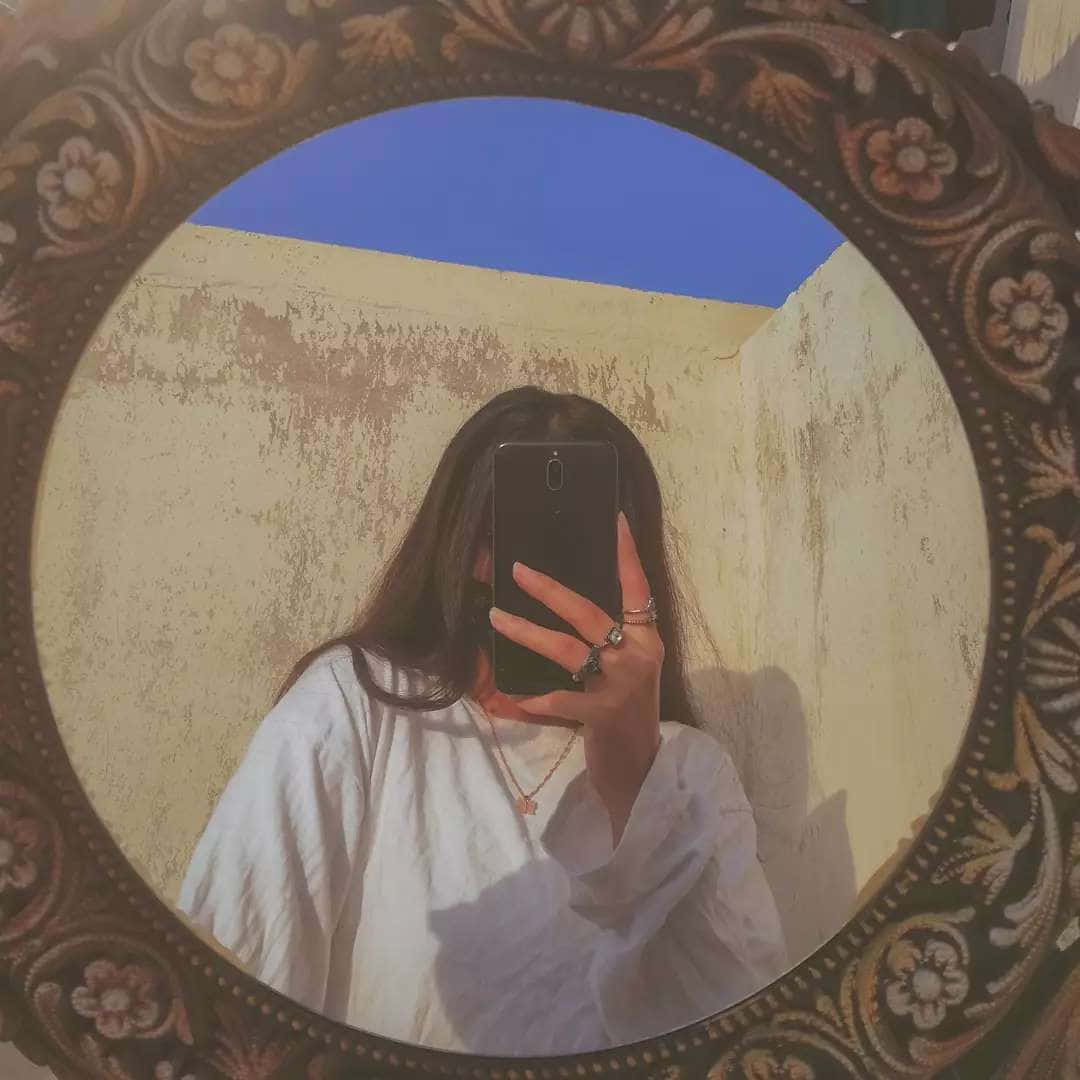ornate circular mirror, white shirt, sunlit wall, SD Desktop Wallpaper