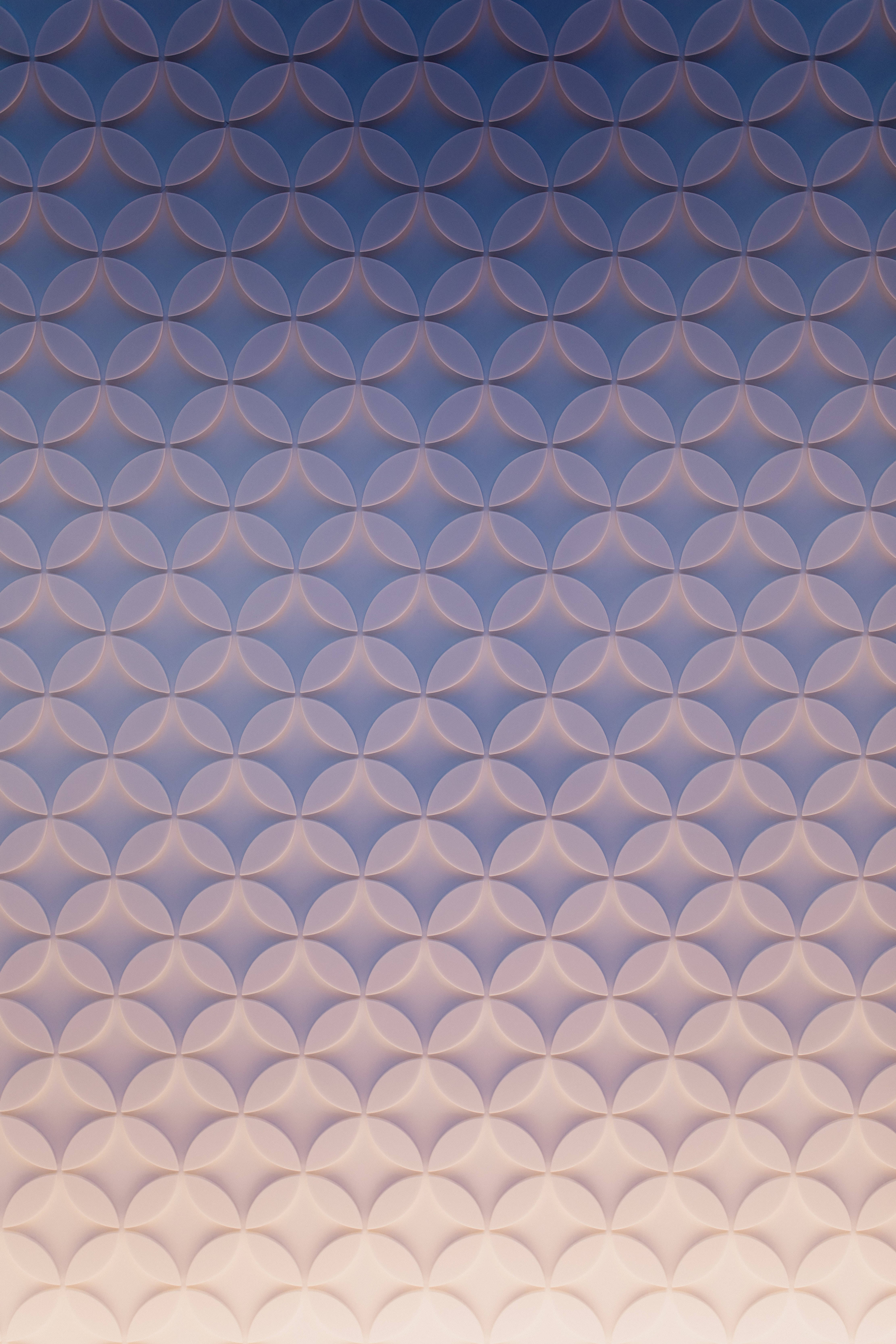 pastel geometric cool pattern, blue to beige gradient, repeating 3D circular patterns, 5K Phone Wallpaper