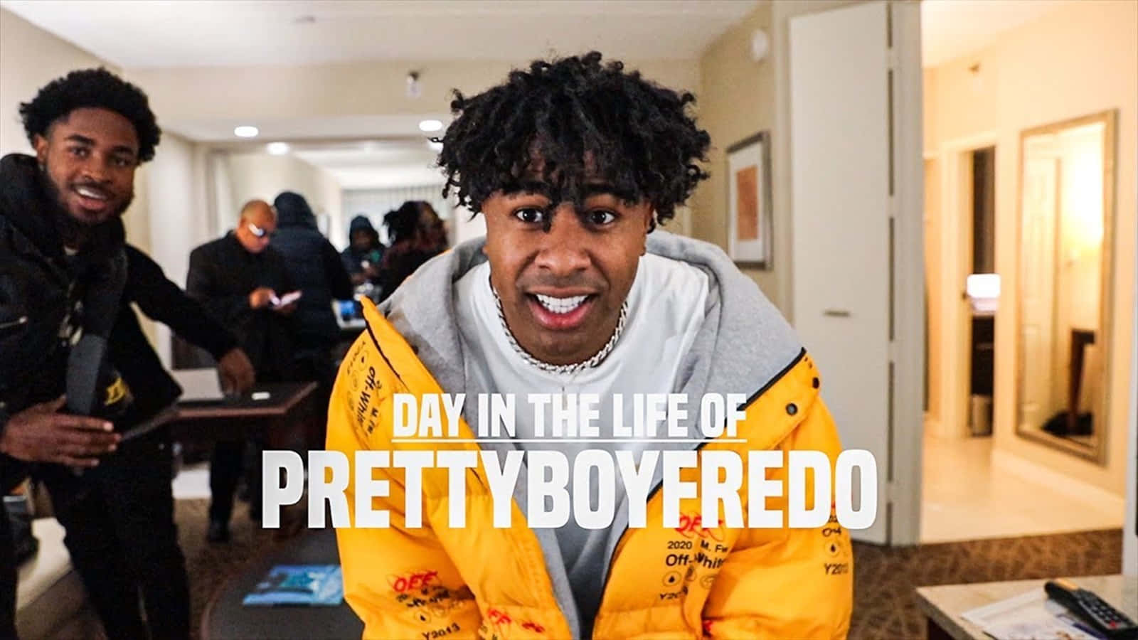 Prettyboyfredo, bright yellow jacket, warmly lit hotel hallway, HD Desktop Wallpaper