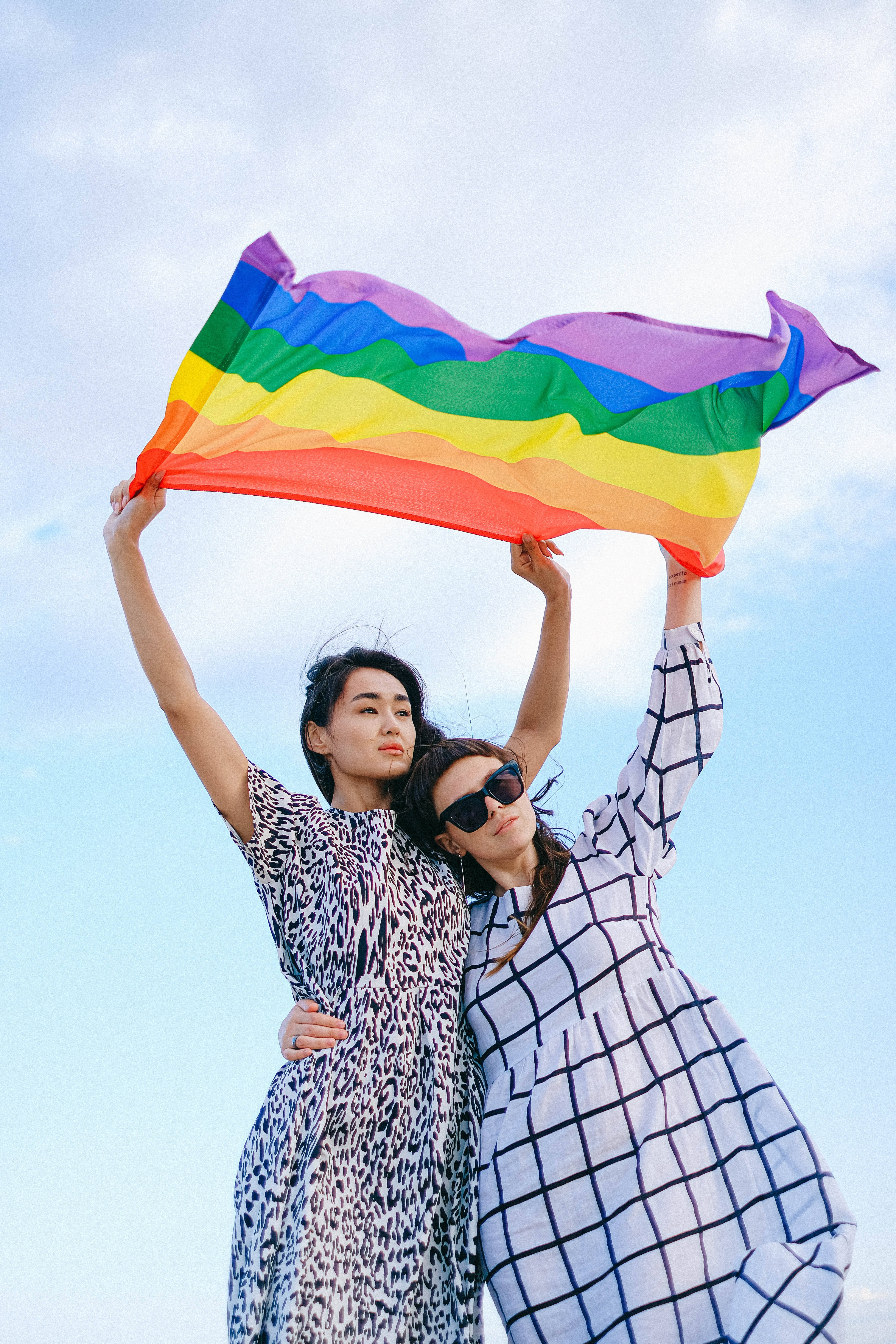 rainbow flag, bright blue sky, scattered clouds, 5K Phone Wallpaper