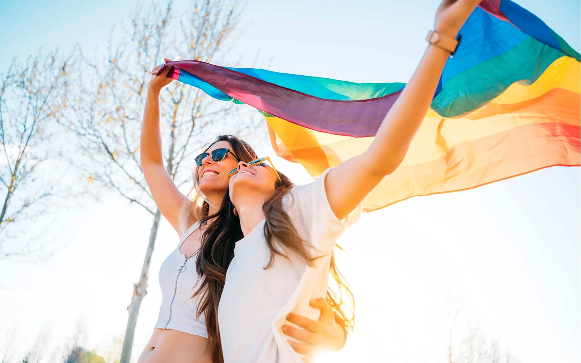 lesbian girl couple, vibrant rainbow flag, bright sunny sky, Full HD Desktop Wallpaper