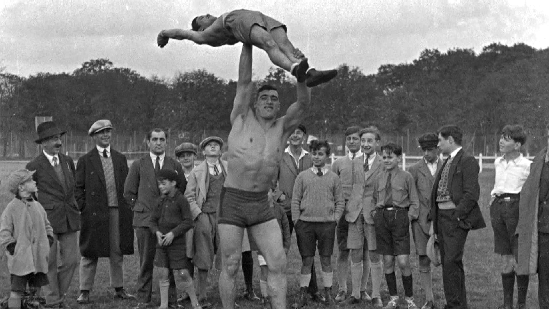 Primo Carnera, shirtless man, grassy field, Full HD Desktop Wallpaper