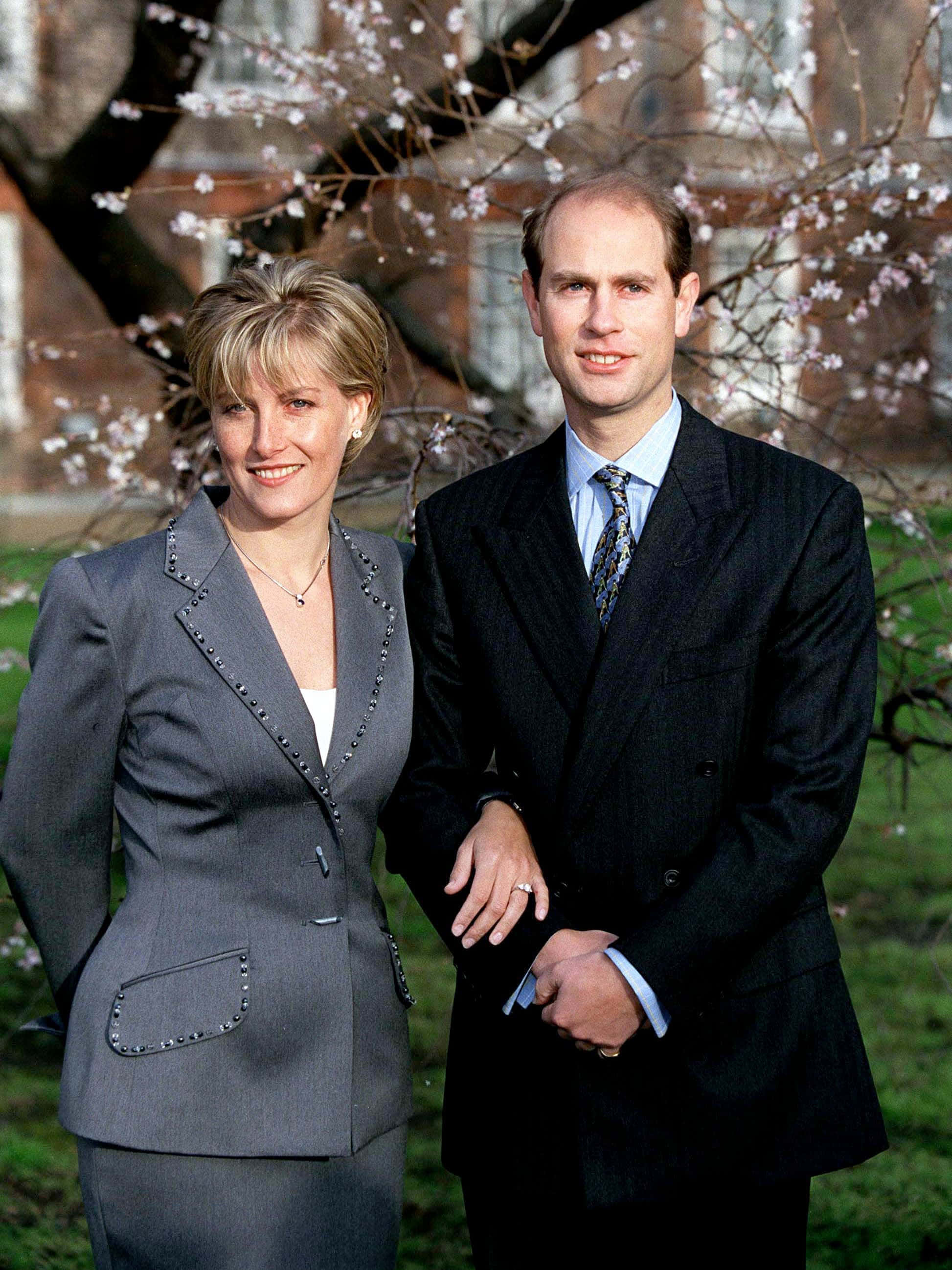 Prince Edward, beautiful wife, cherry blossom branches, 2K Phone Wallpaper