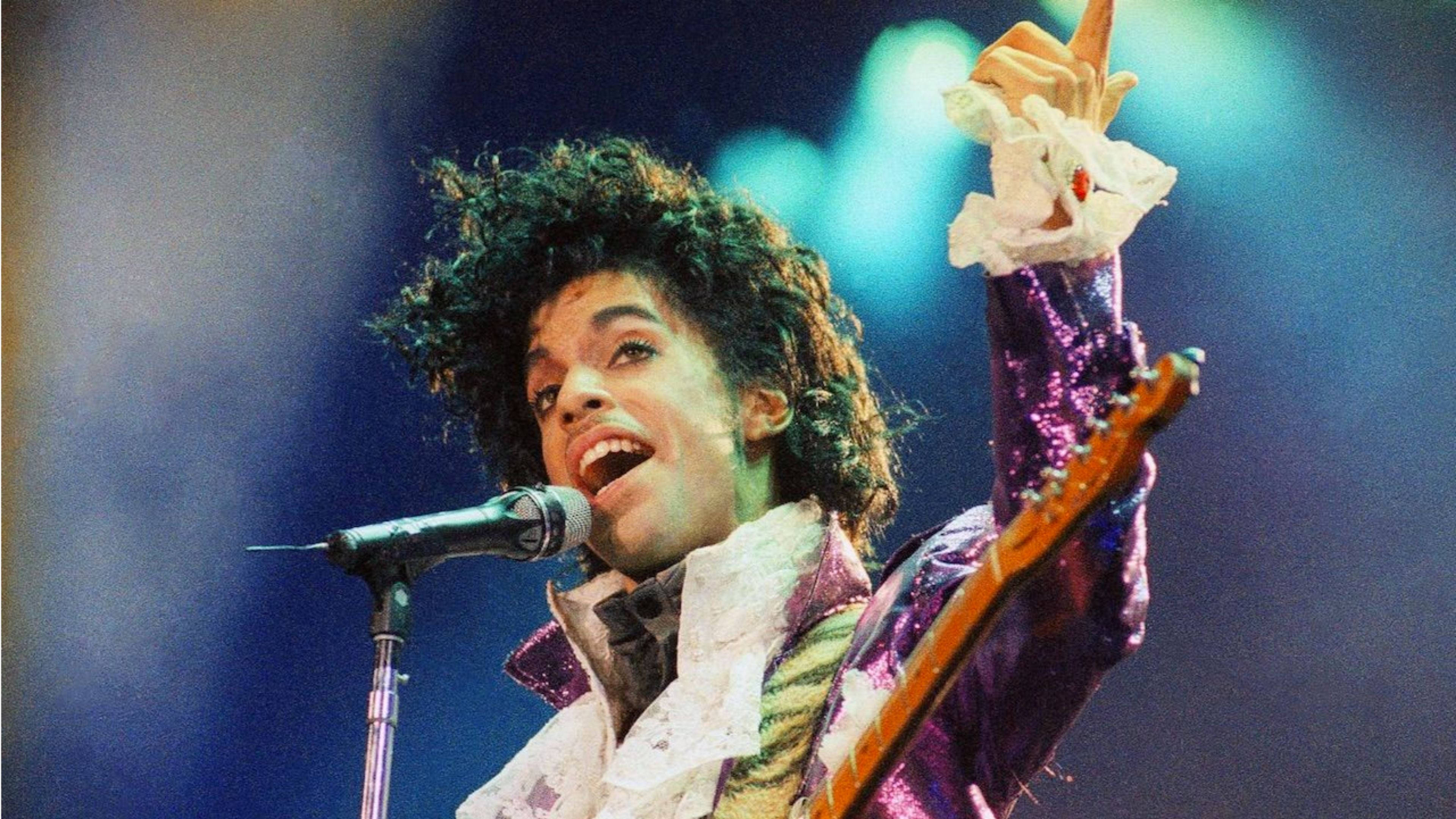 Prince, glittering purple outfit, guitar, 4K Desktop Wallpaper