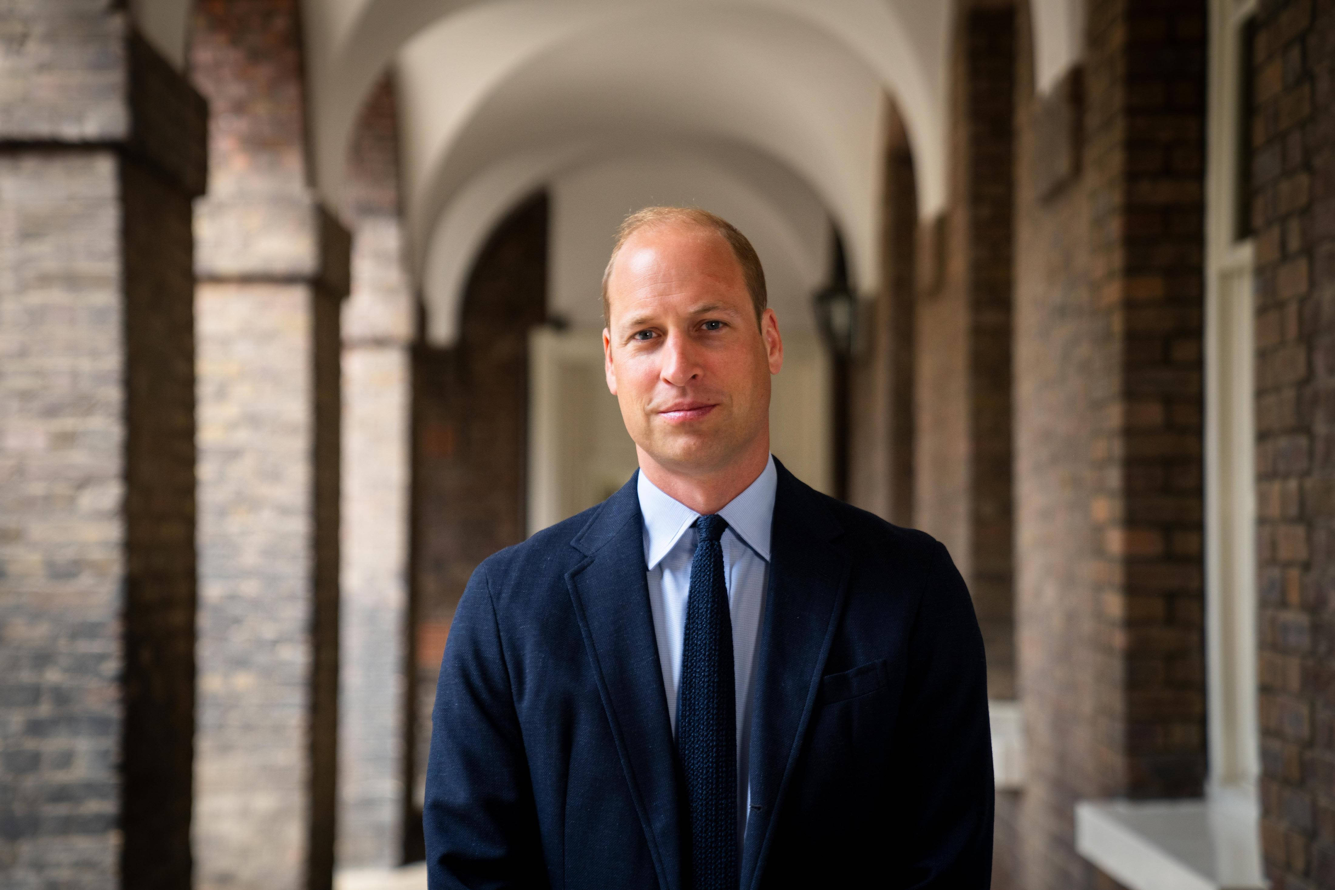Prince William, navy suit, brick archway colonnade, 4K Desktop Wallpaper