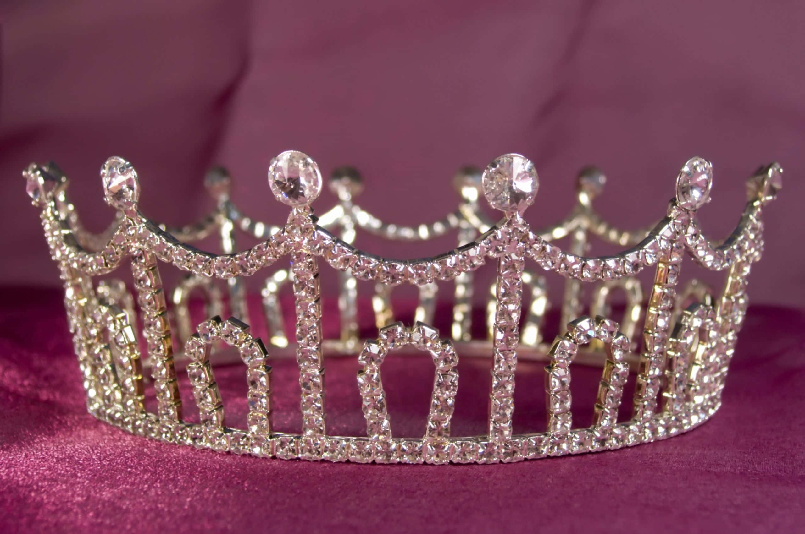 Princess Crown, diamond-encrusted tiara, rich purple velvet surface, 2K Desktop Wallpaper