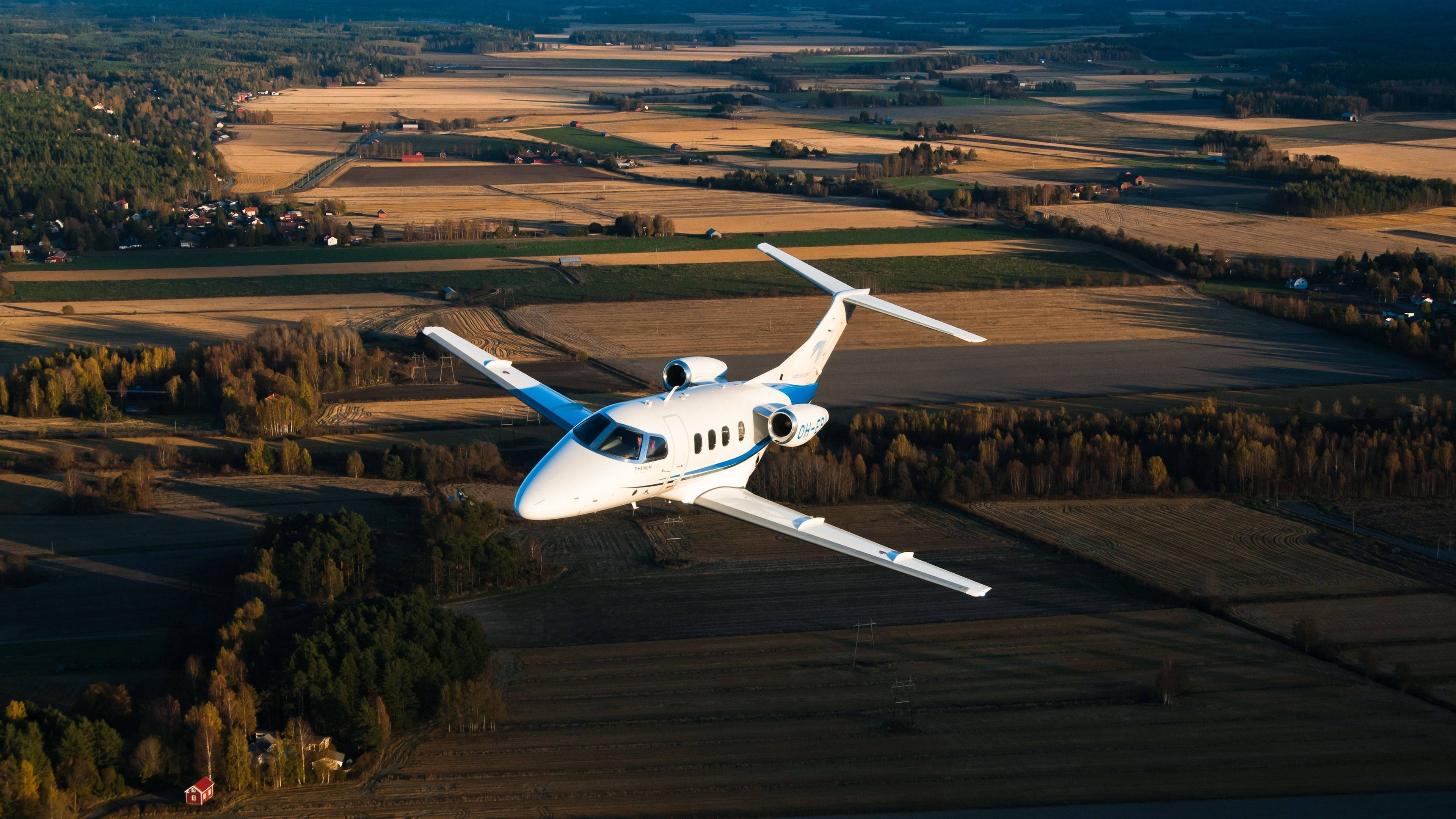 private jet, white and blue, golden autumn fields, 4K Desktop Wallpaper