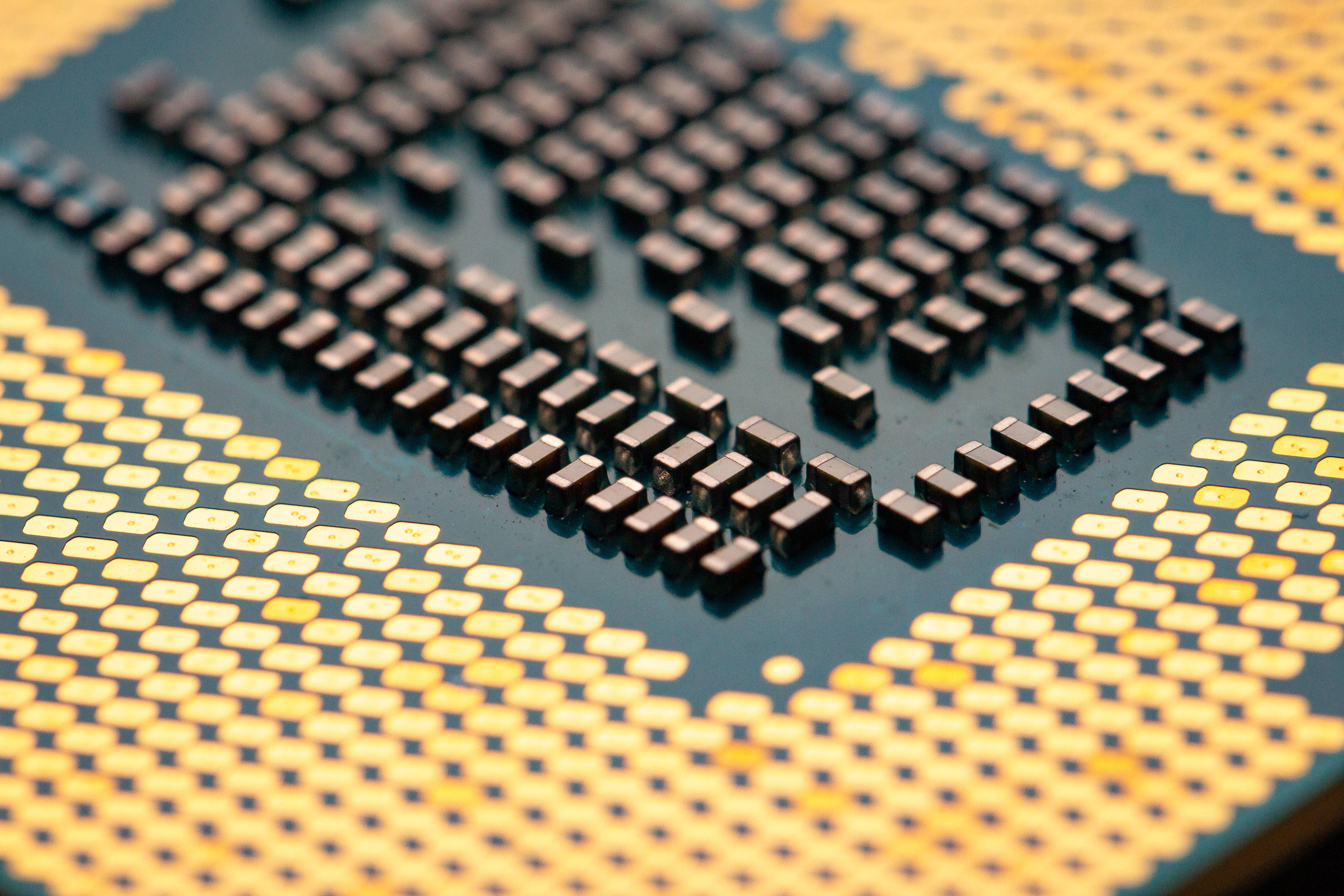 CPU chip, golden pins, black square contacts, 5K Desktop Wallpaper
