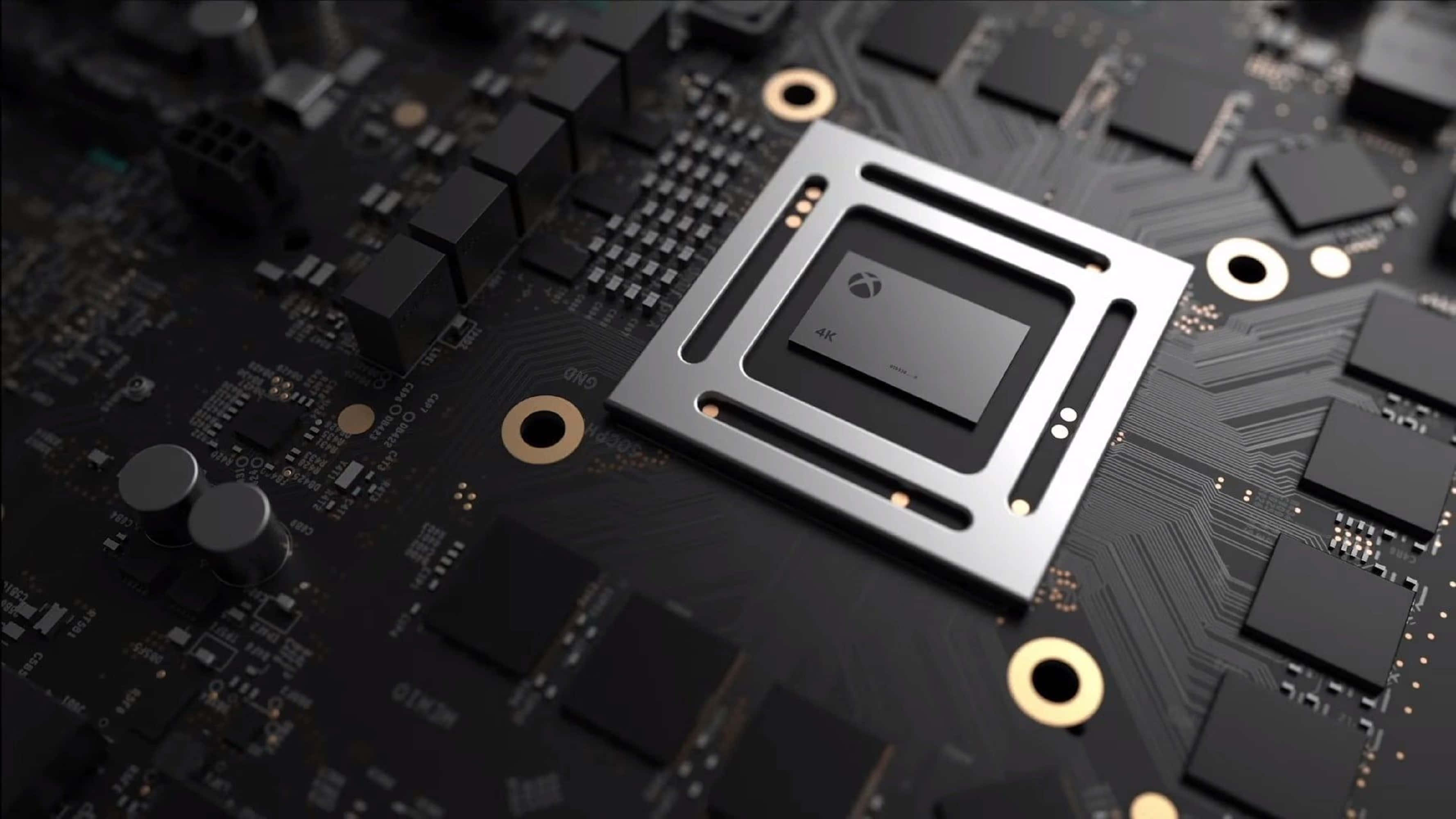 Xbox GPU chip, black circuit board, gold and silver traces, 2K Desktop Wallpaper