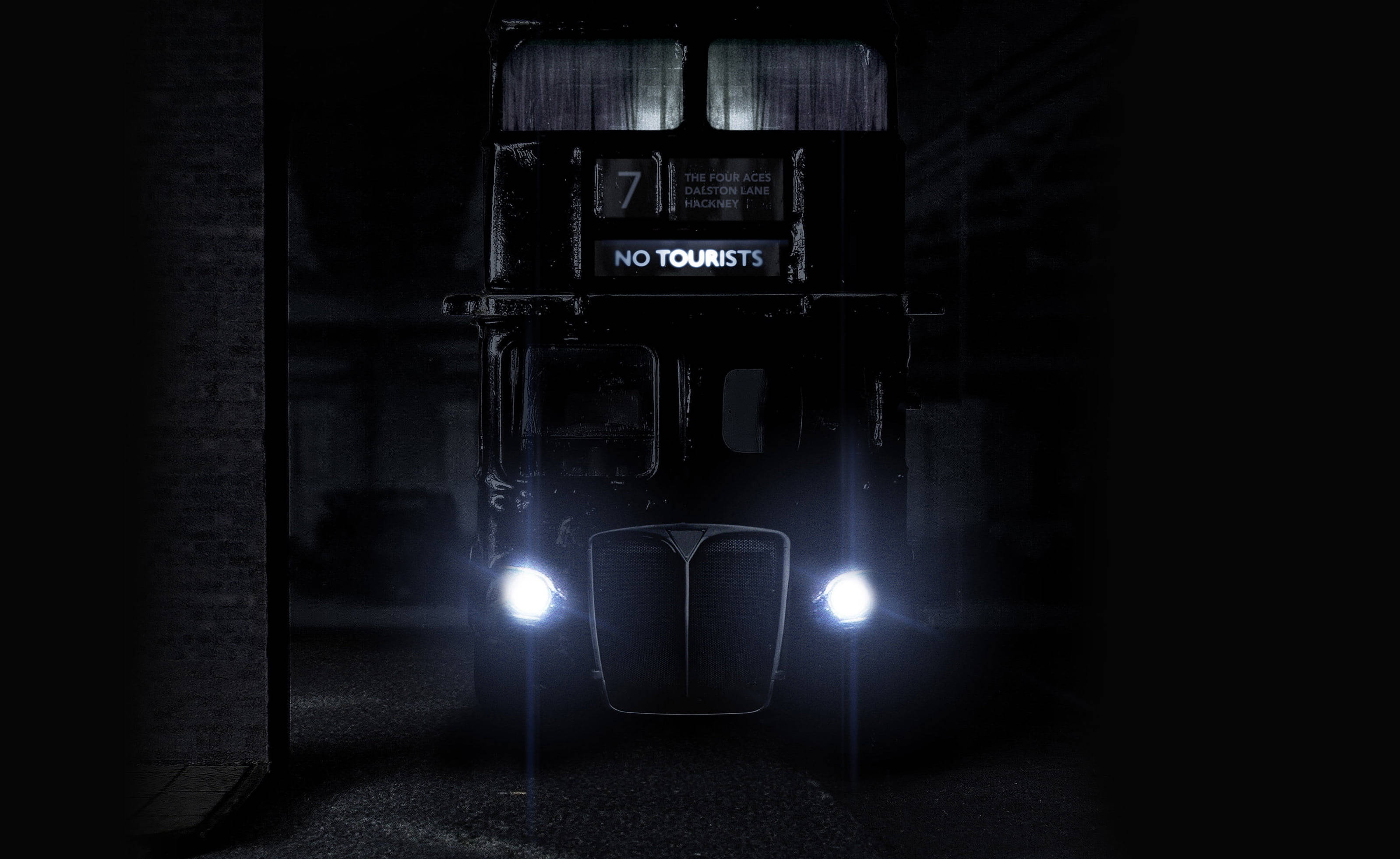 The Prodigy, vintage black double-decker bus, glowing headlights, 2K Desktop Wallpaper