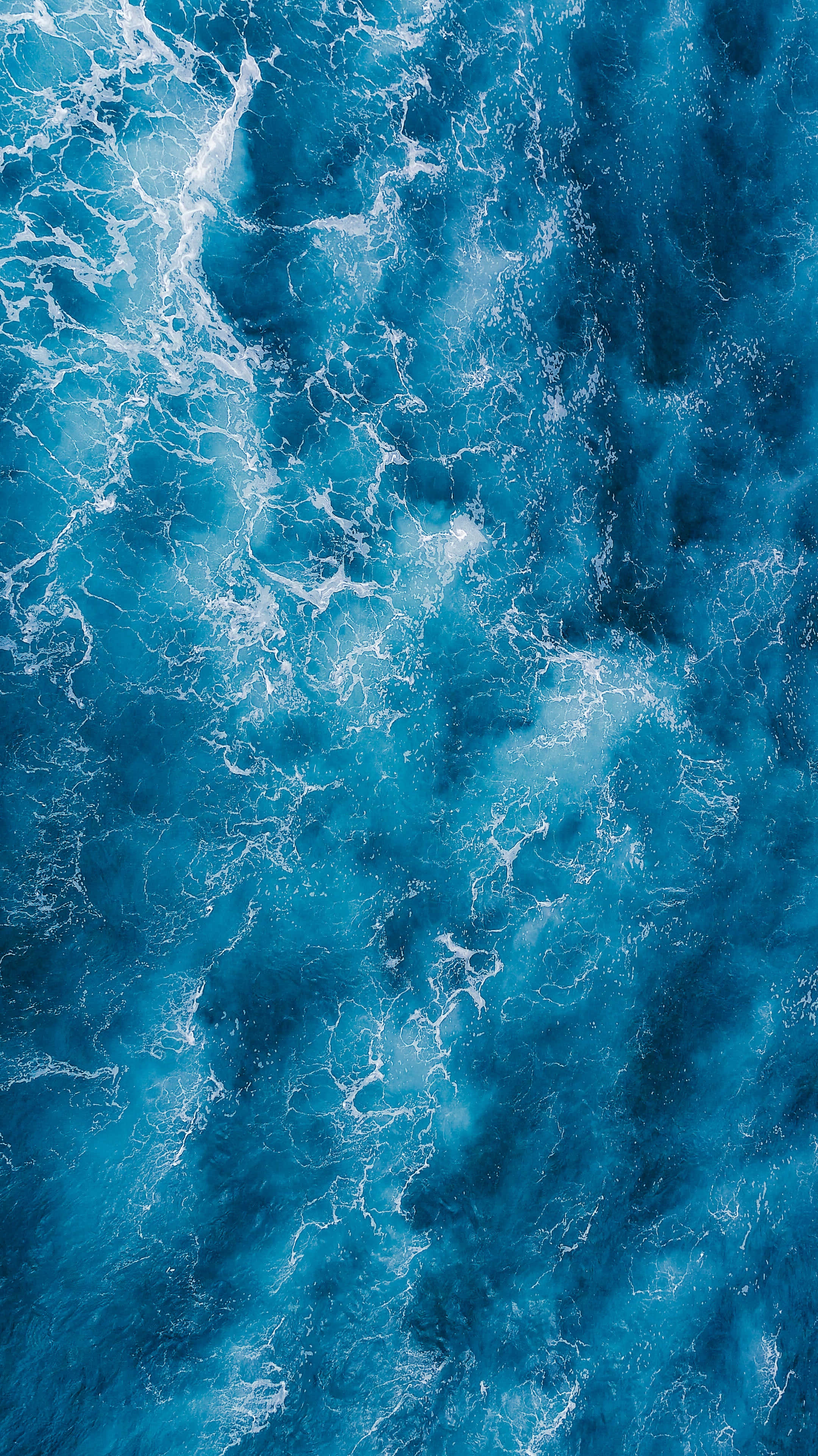 Professional iPhone, turbulent ocean waves, deep blue, 4K Phone Wallpaper