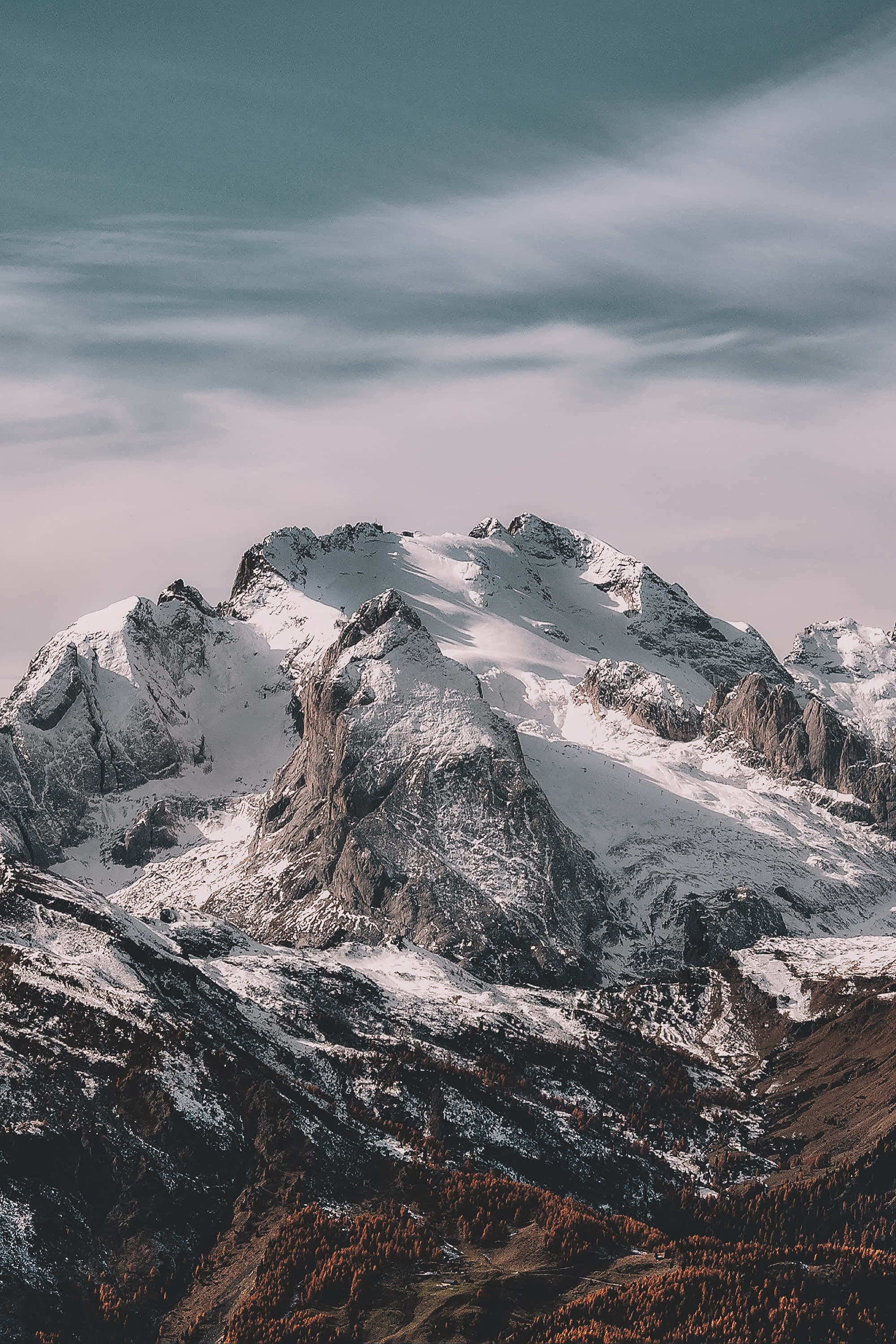 Professional iPhone, snow-capped mountain peak, cloudy sky, 2K Phone Wallpaper
