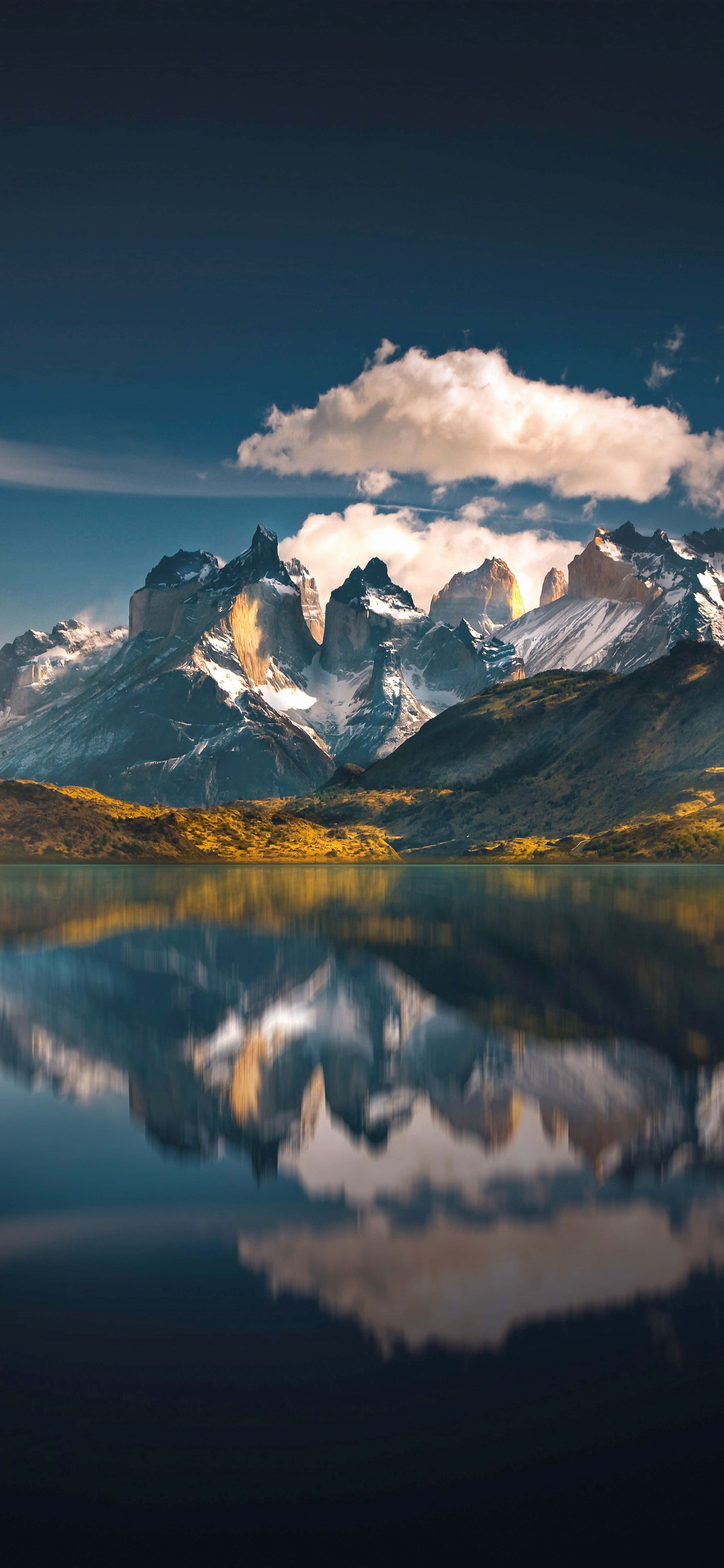 Professional iPhone, snowcapped mountain peaks, deep blue sky, 5K Phone Wallpaper
