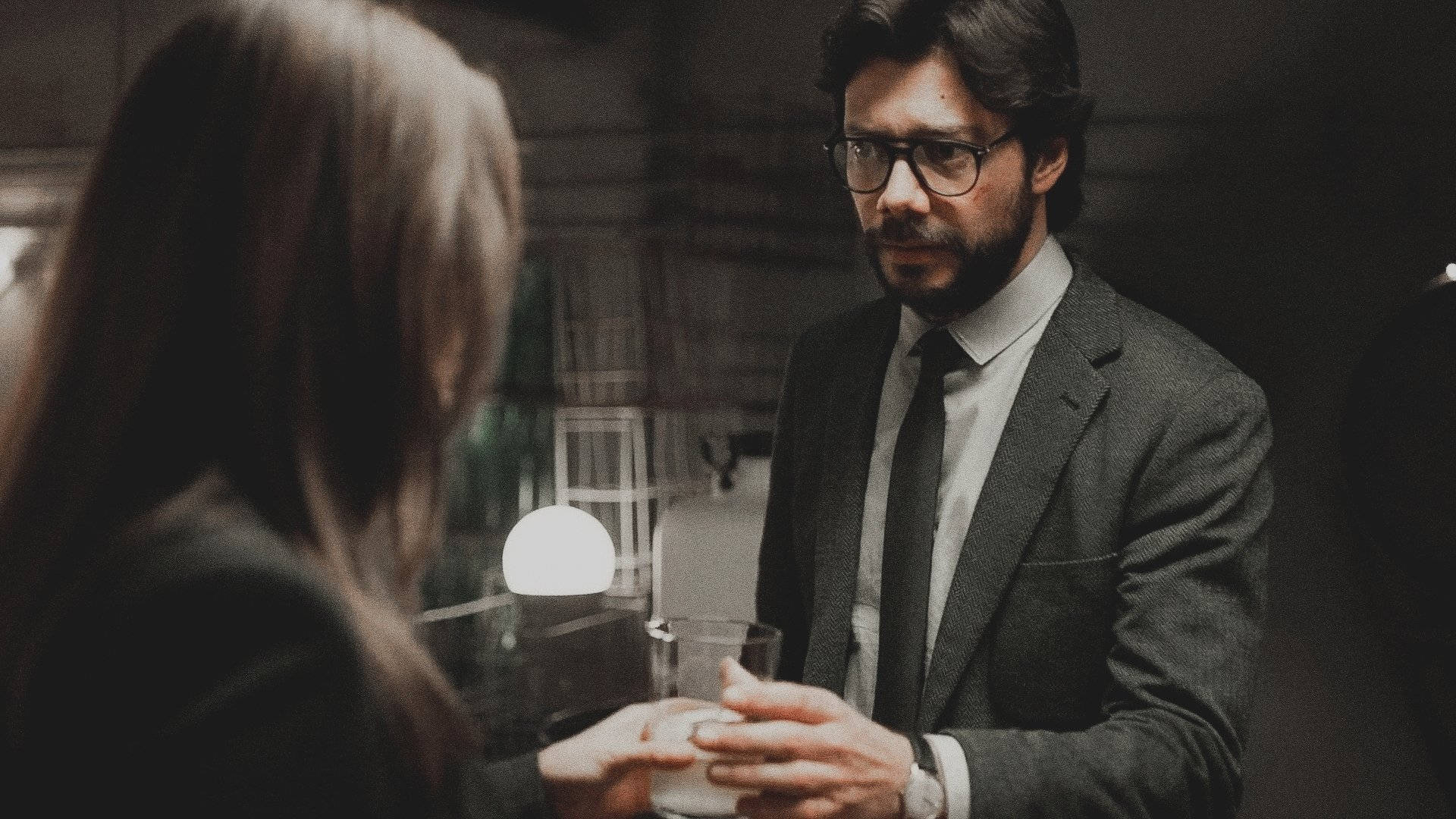 Professor Money Heist, man in a suit and glasses, woman in a dimly lit modern interior, Full HD Desktop Wallpaper