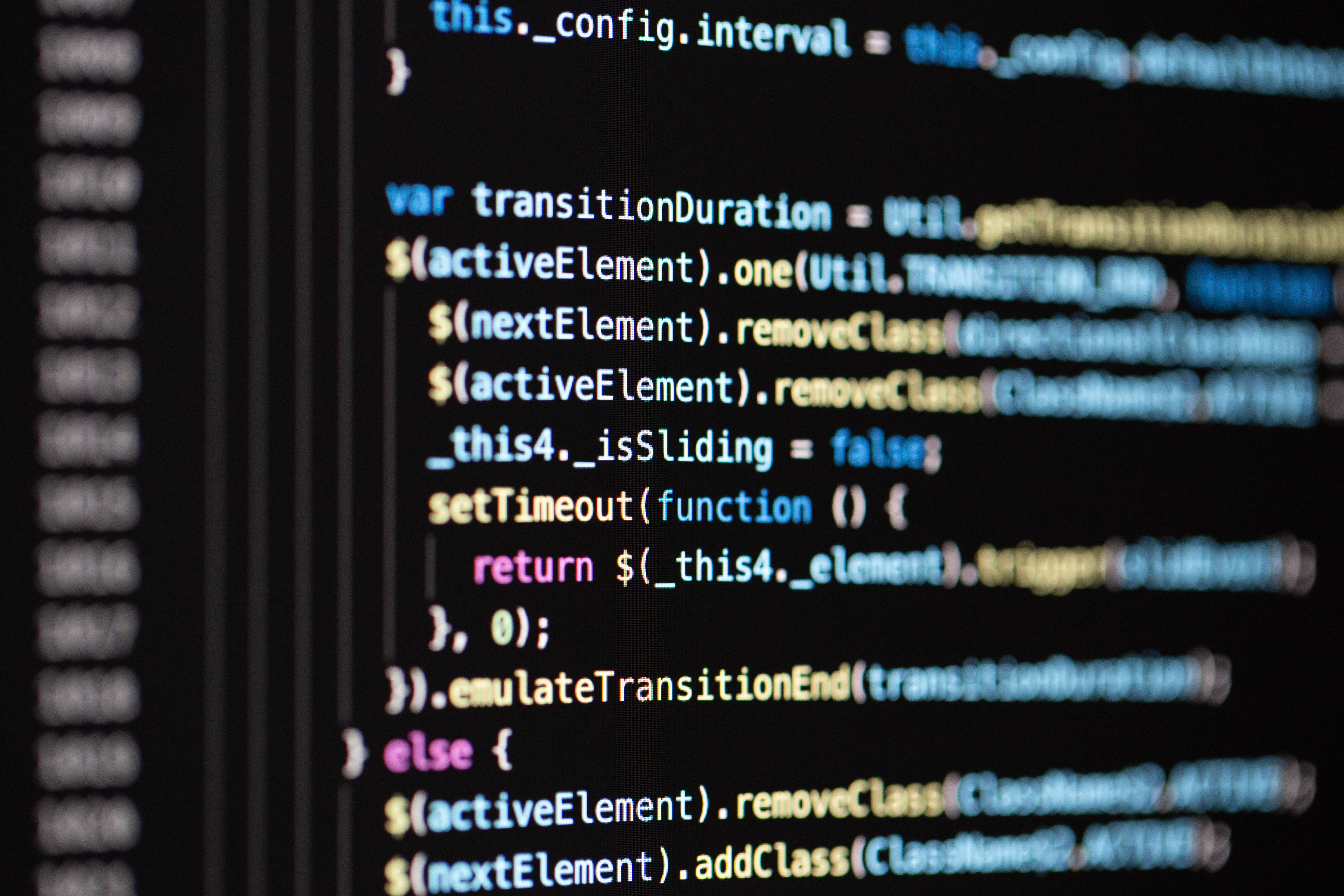 glowing colorful code lines, dark screen, shallow depth of field, 5K Desktop Wallpaper