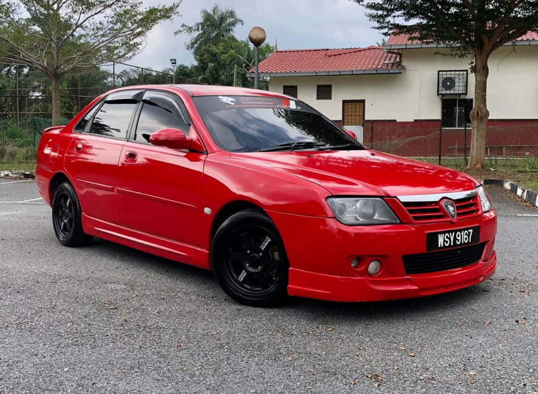 Red Proton Waja, glossy red, black rims, SD Desktop Wallpaper
