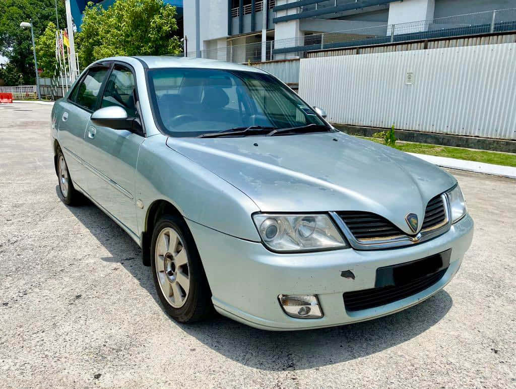 Proton Waja, silver sedan, concrete lot, SD Desktop Wallpaper