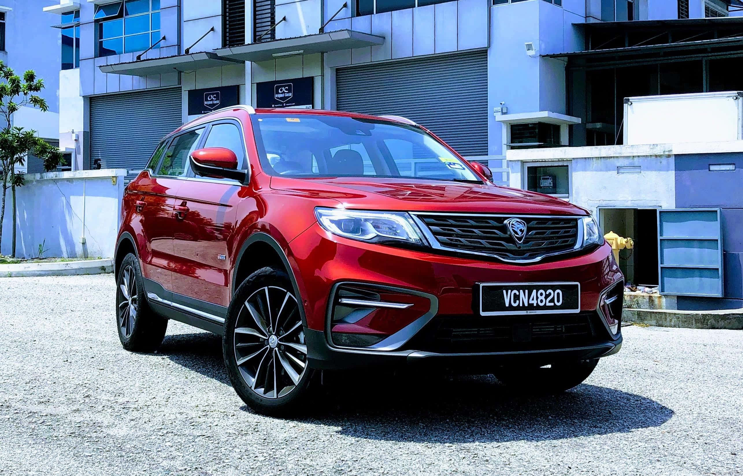 Proton X70, glossy red, gravel, 2K Desktop Wallpaper