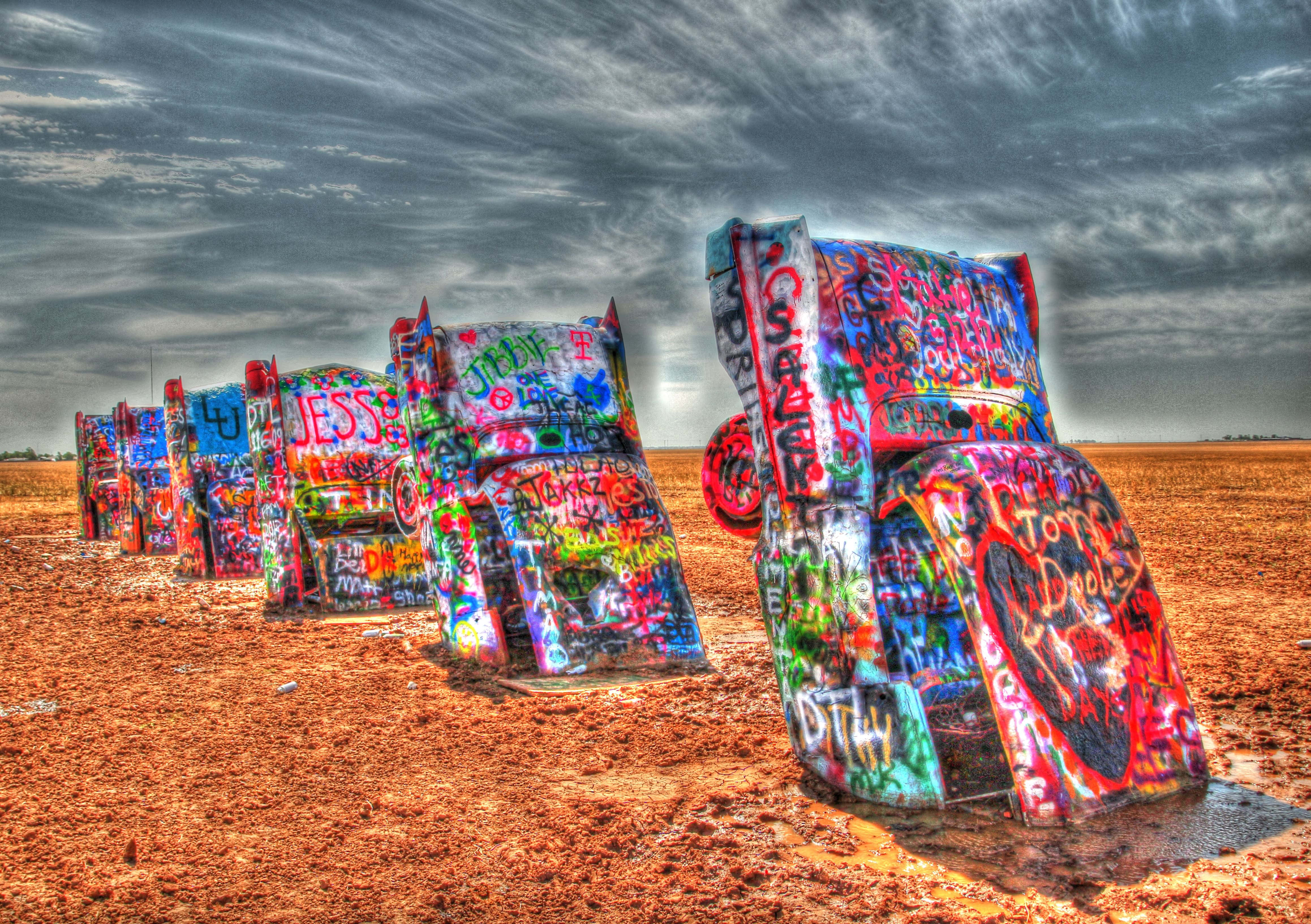 Psychedelic 70s Aesthetic, graffiti-covered cars, red dirt, 4K Desktop Wallpaper