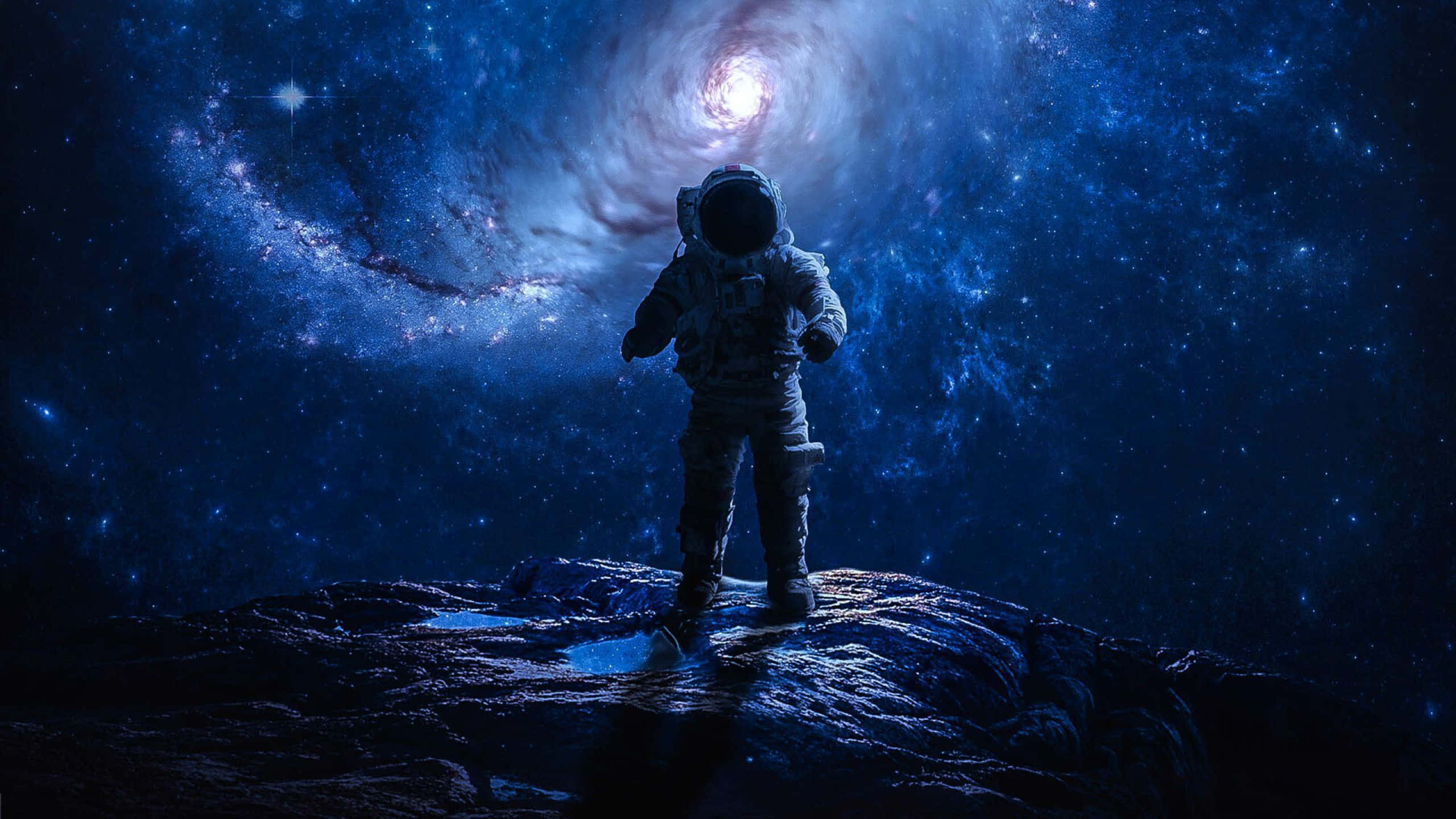 Psychedelic Space, astronaut, rocky outcrop, 2K Desktop Wallpaper
